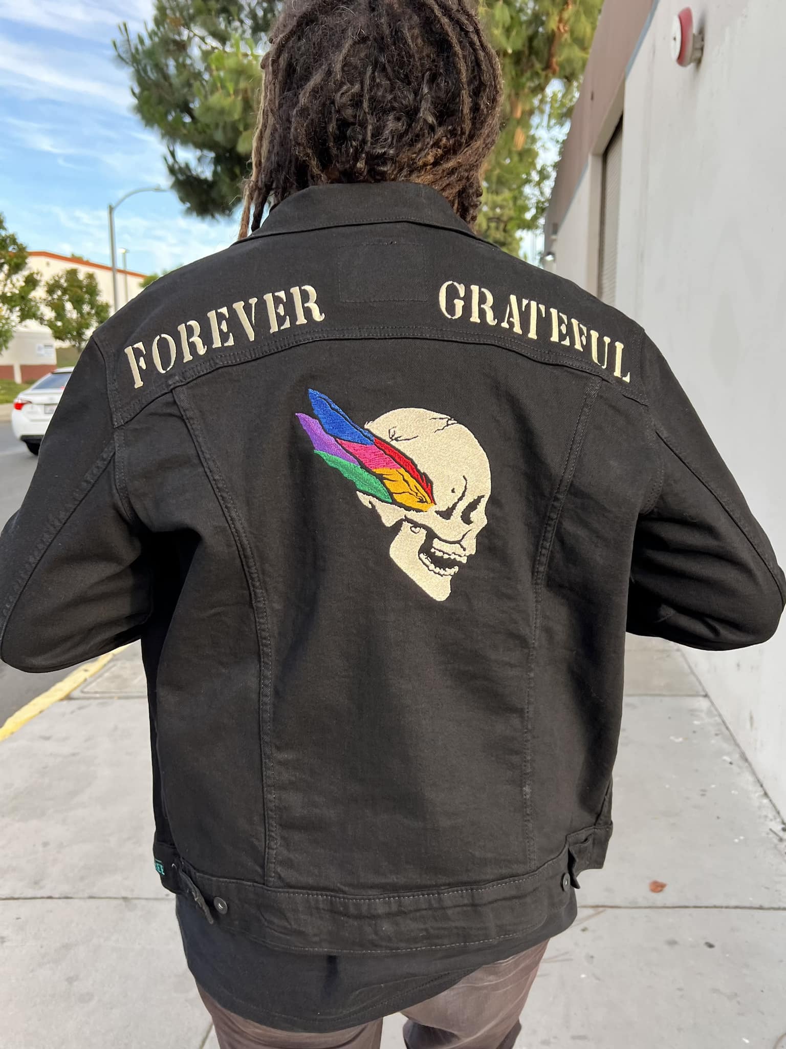 Custom feathered skull jackets with embroidery