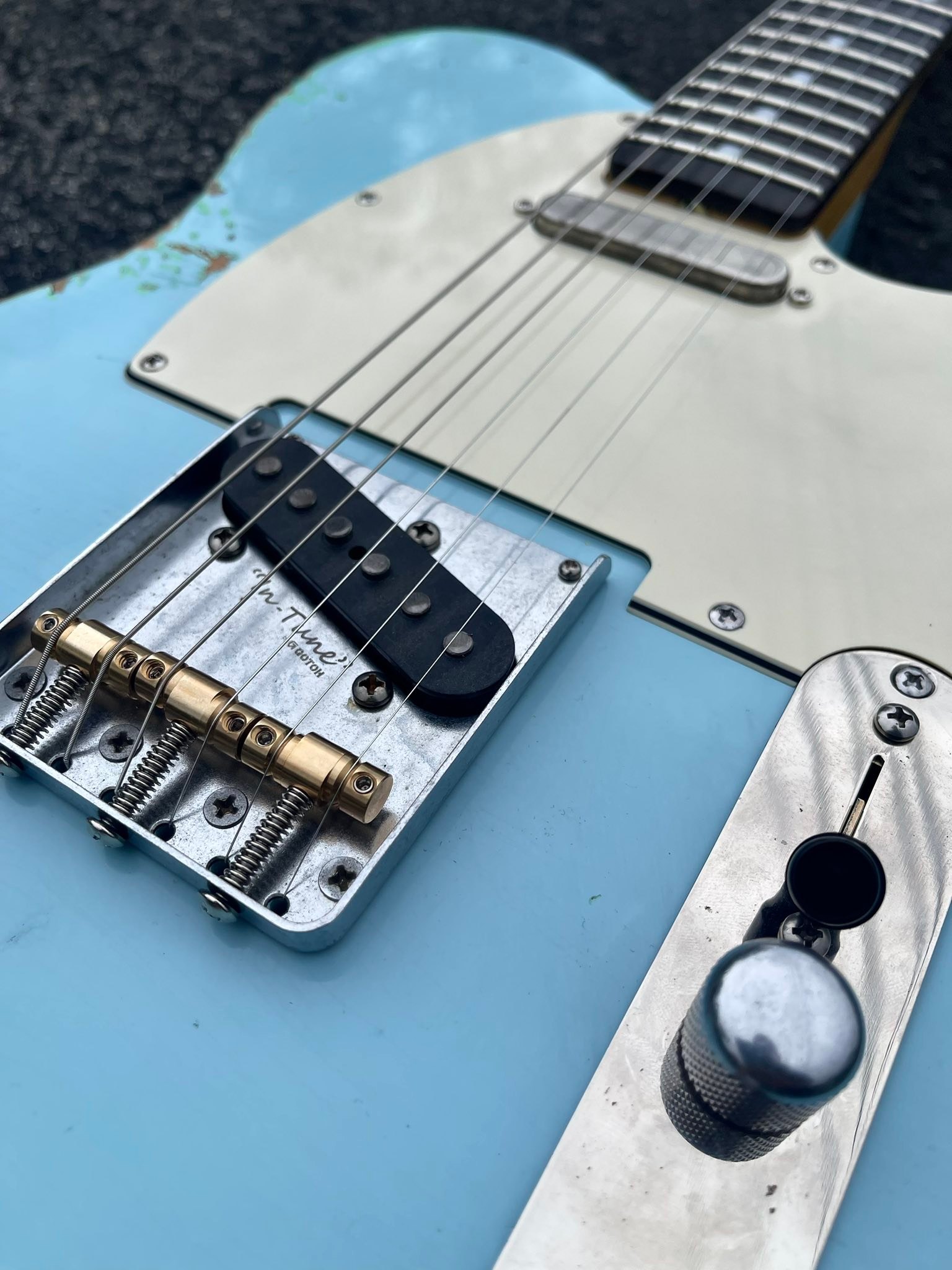 JL Custom Guitars' sonic blue T-style guitar with 55 blackguard