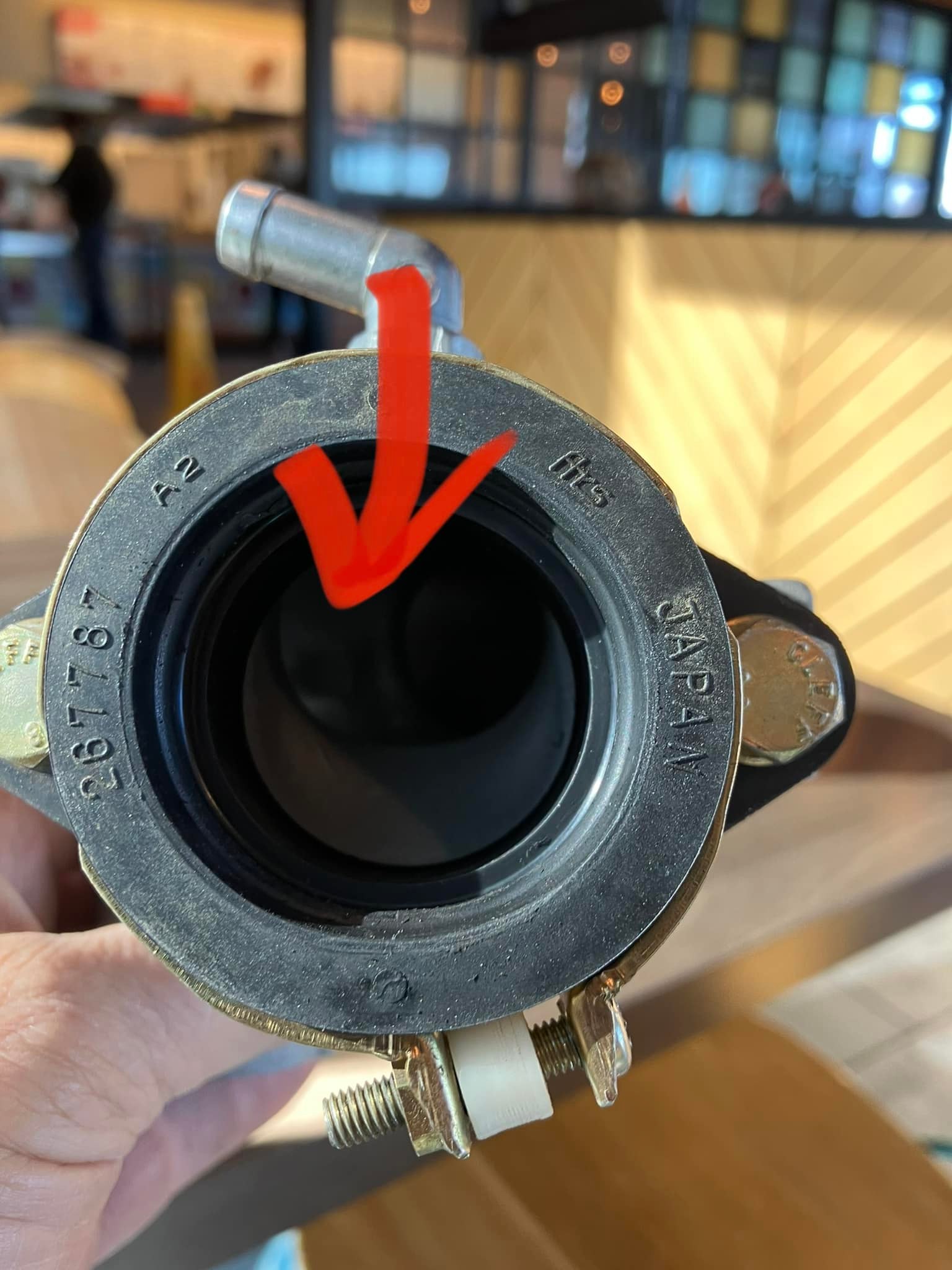 Is it normal for the front cylinder to run richer at idle?