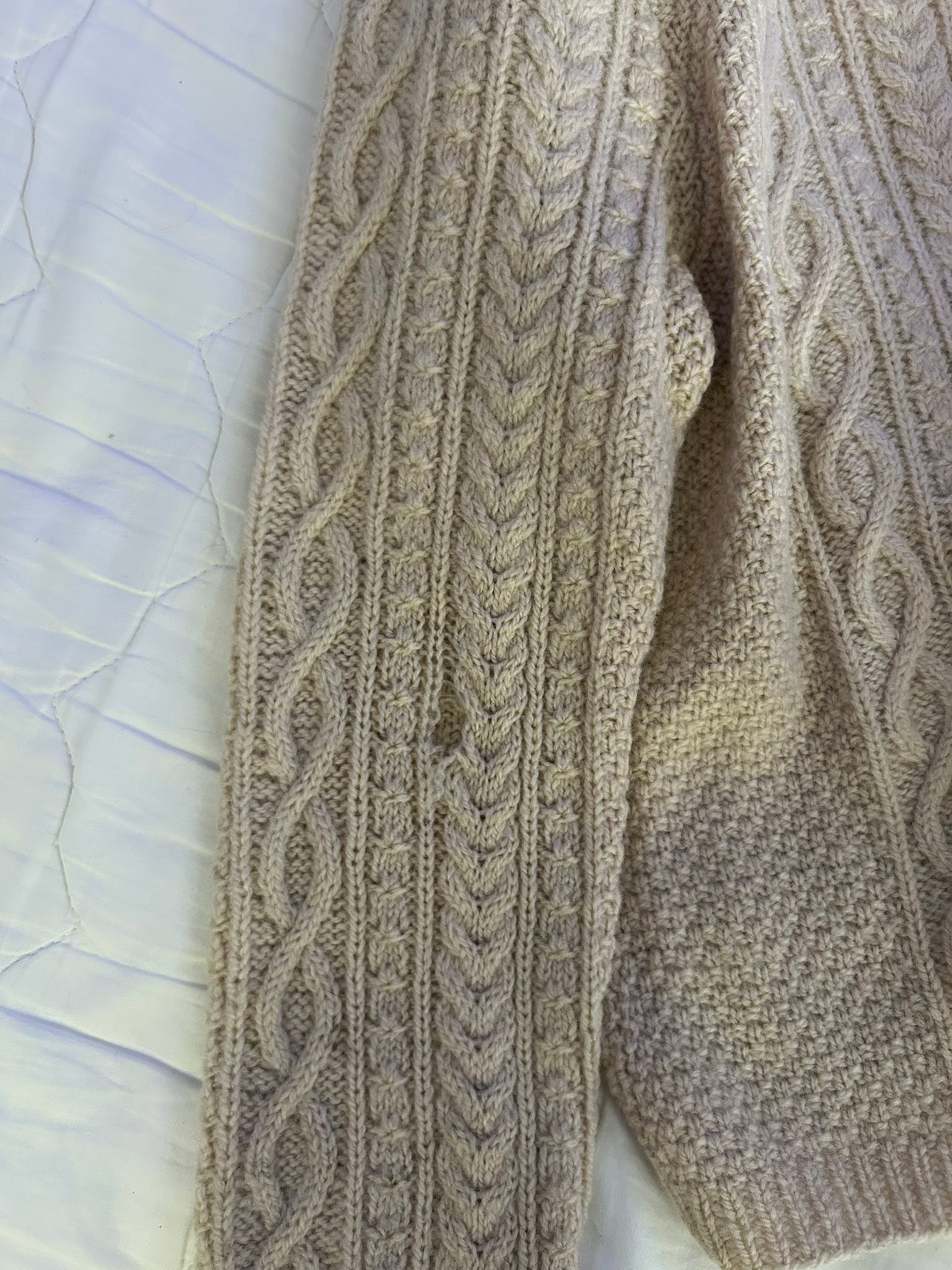 How to repair old wool sweater?