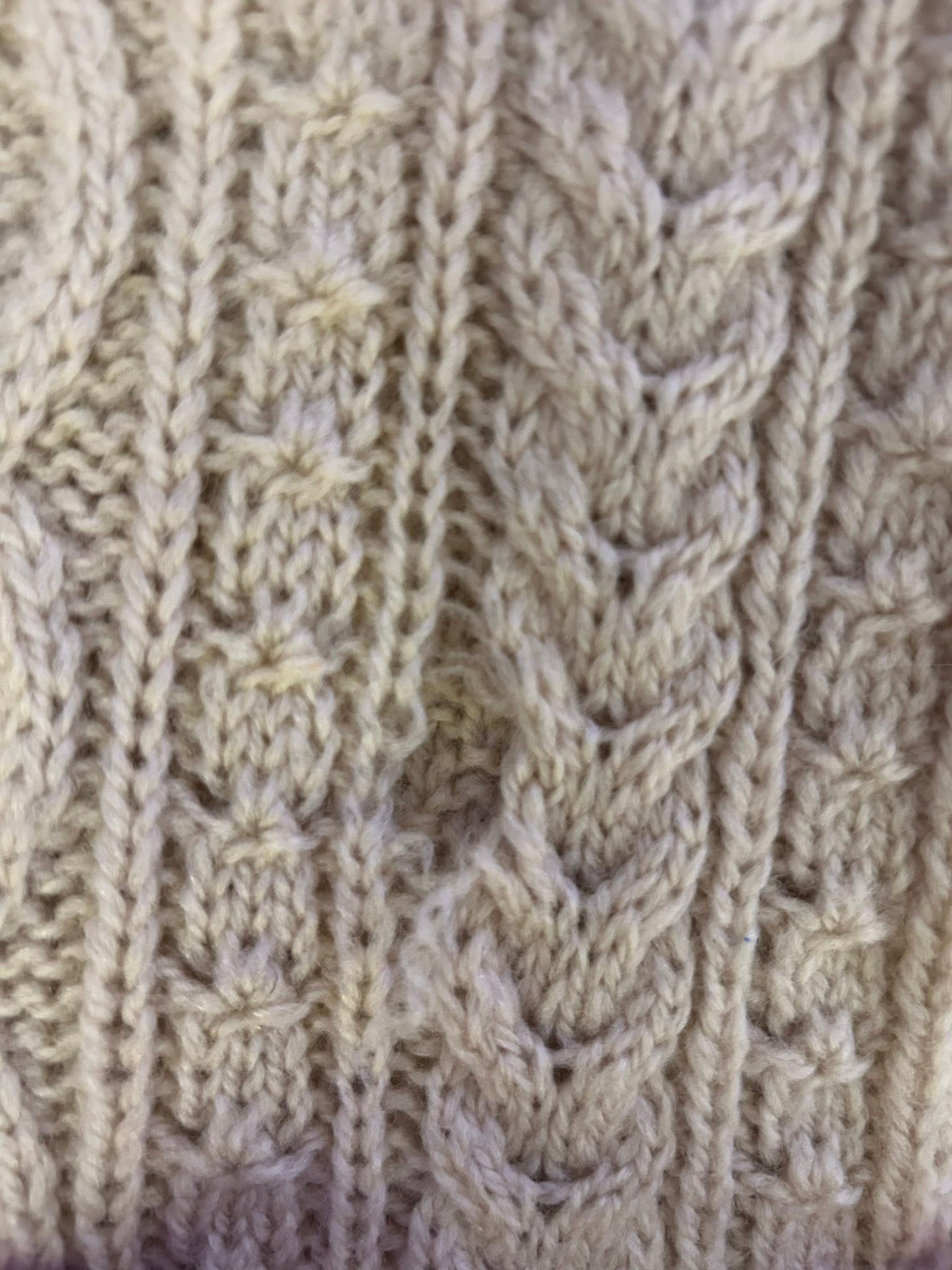 How to repair old wool sweater?