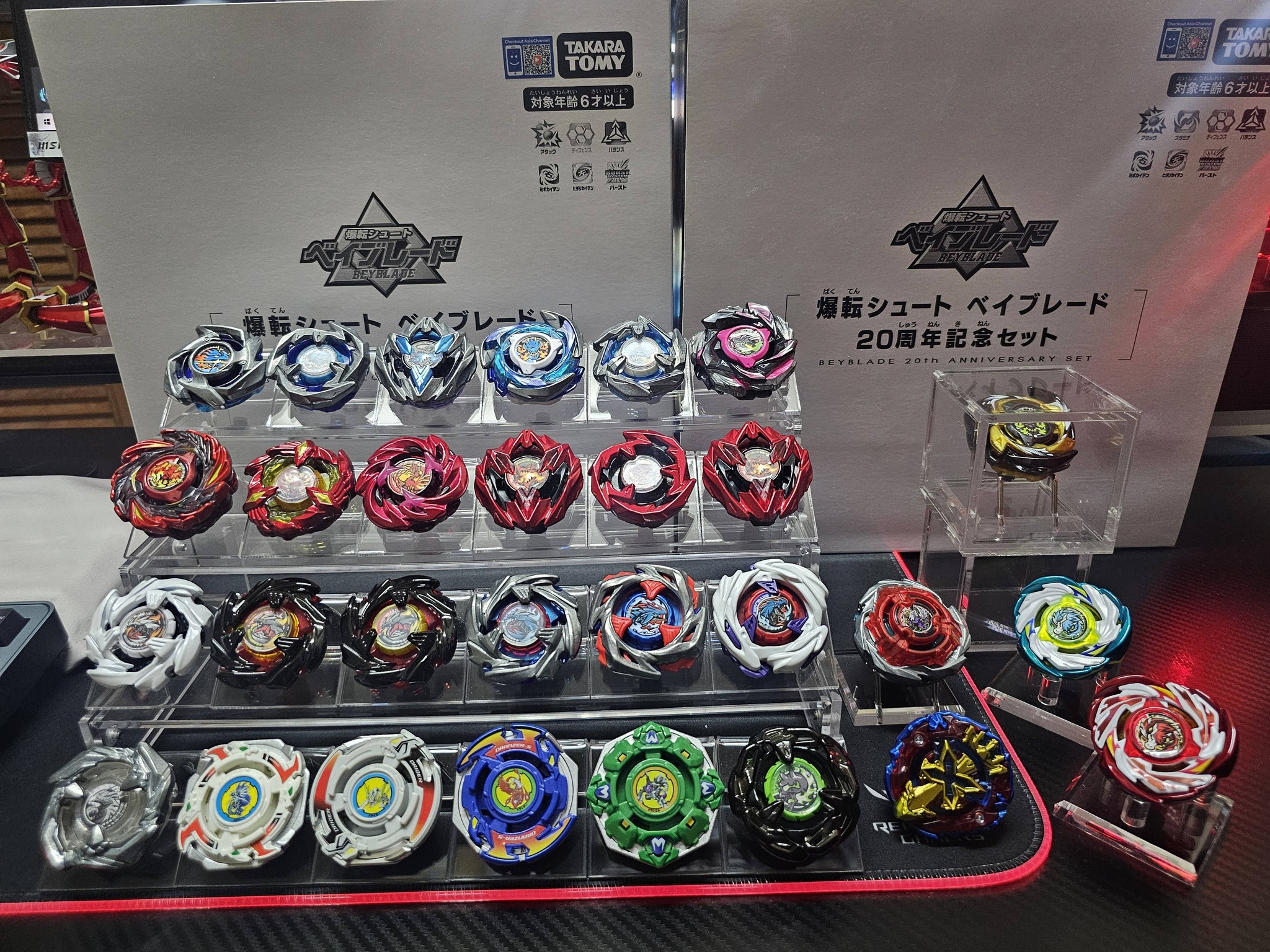 Beyblade X collection with new beys and acrylic stand