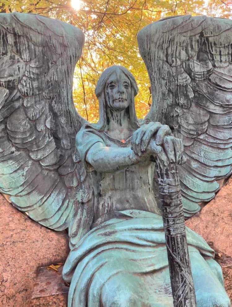 Haserot Angel statue in Cleveland, Ohio, receives gifts from visitors