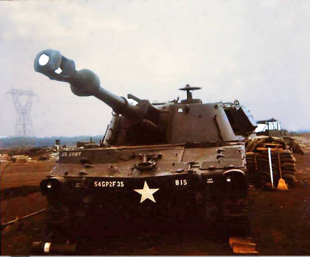LZ Snoopy artillerymen fire 155 Howitzer.