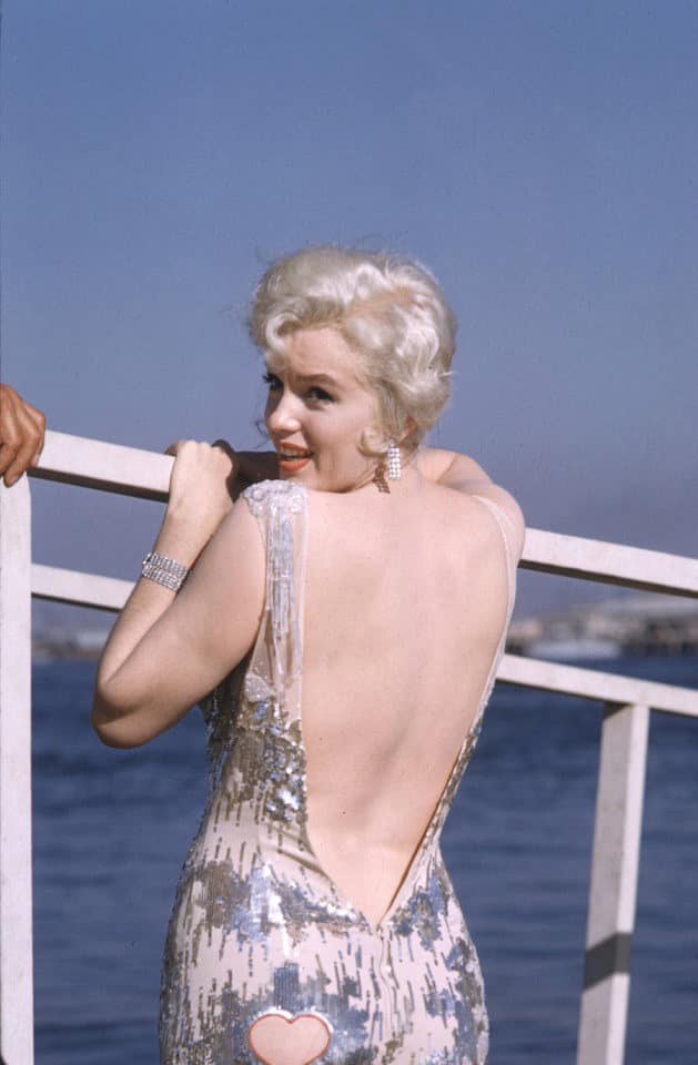 A quiet behind-the-scenes moment: Marilyn Monroe and costume designer Orry-Kelly perfecting the look for Some Like It Hot (1959)