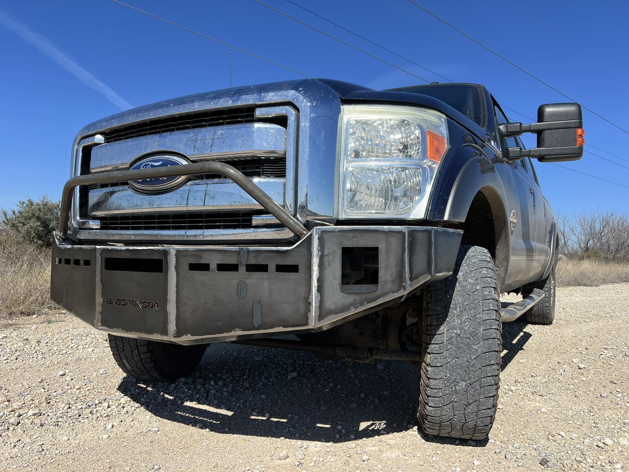 Steel Front Bumper Face Bar For 2011-2016 Ford F250/F350/F450 Super Duty – With Fog Light Cutouts