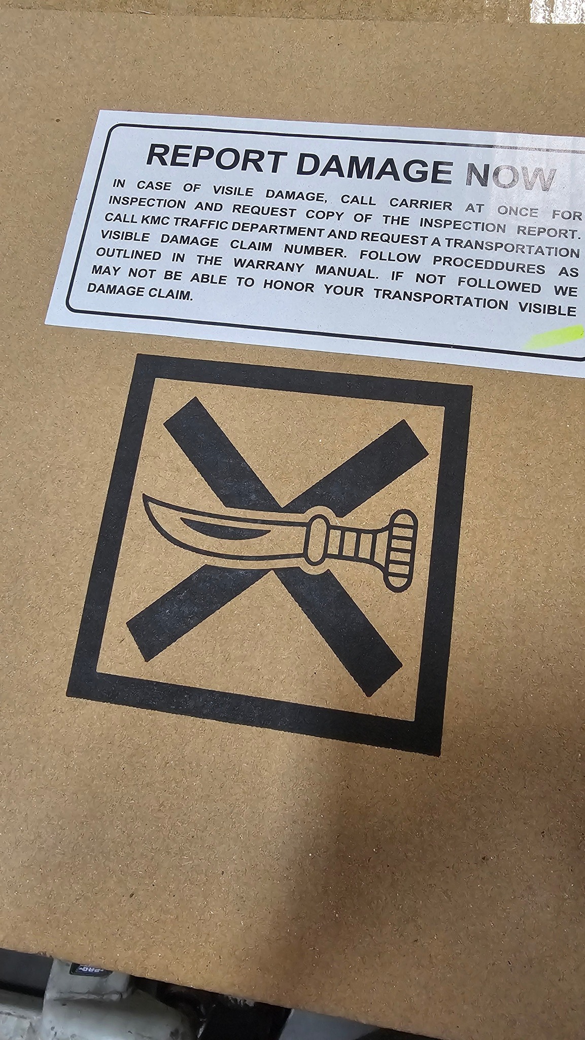 Kawasaki's Unique Warning Label on Motorcycle Crates