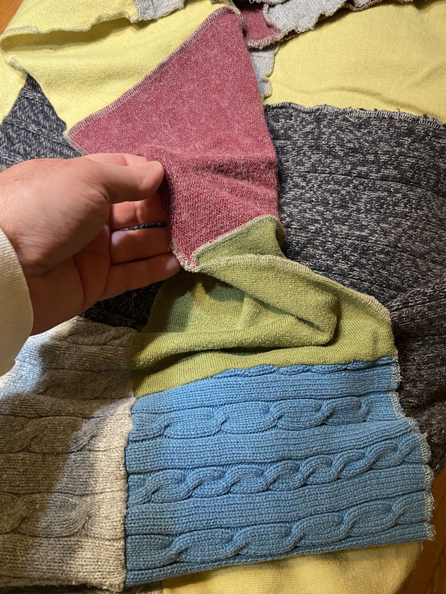 What are ways to finish up-cycled sweater blankets?