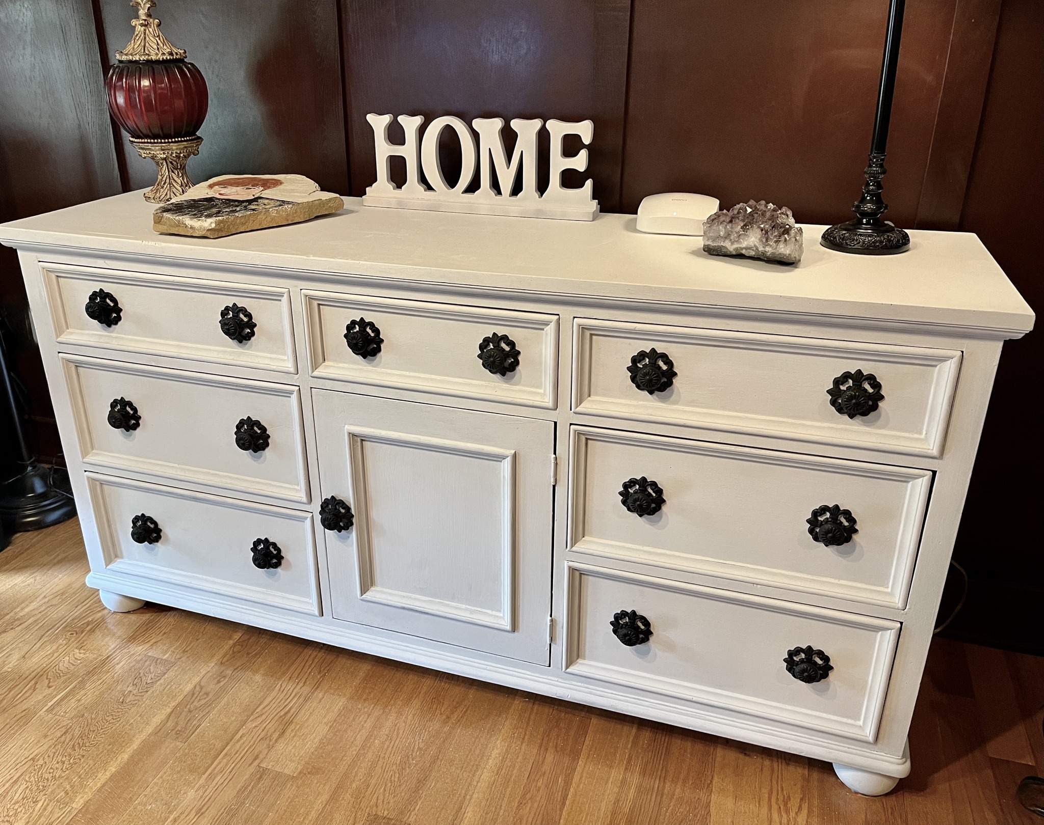 The new knobs for my office dresser are now on! I was actually happy with the black wooden knobs, but wanted something with some character. Below are the new knobs and former