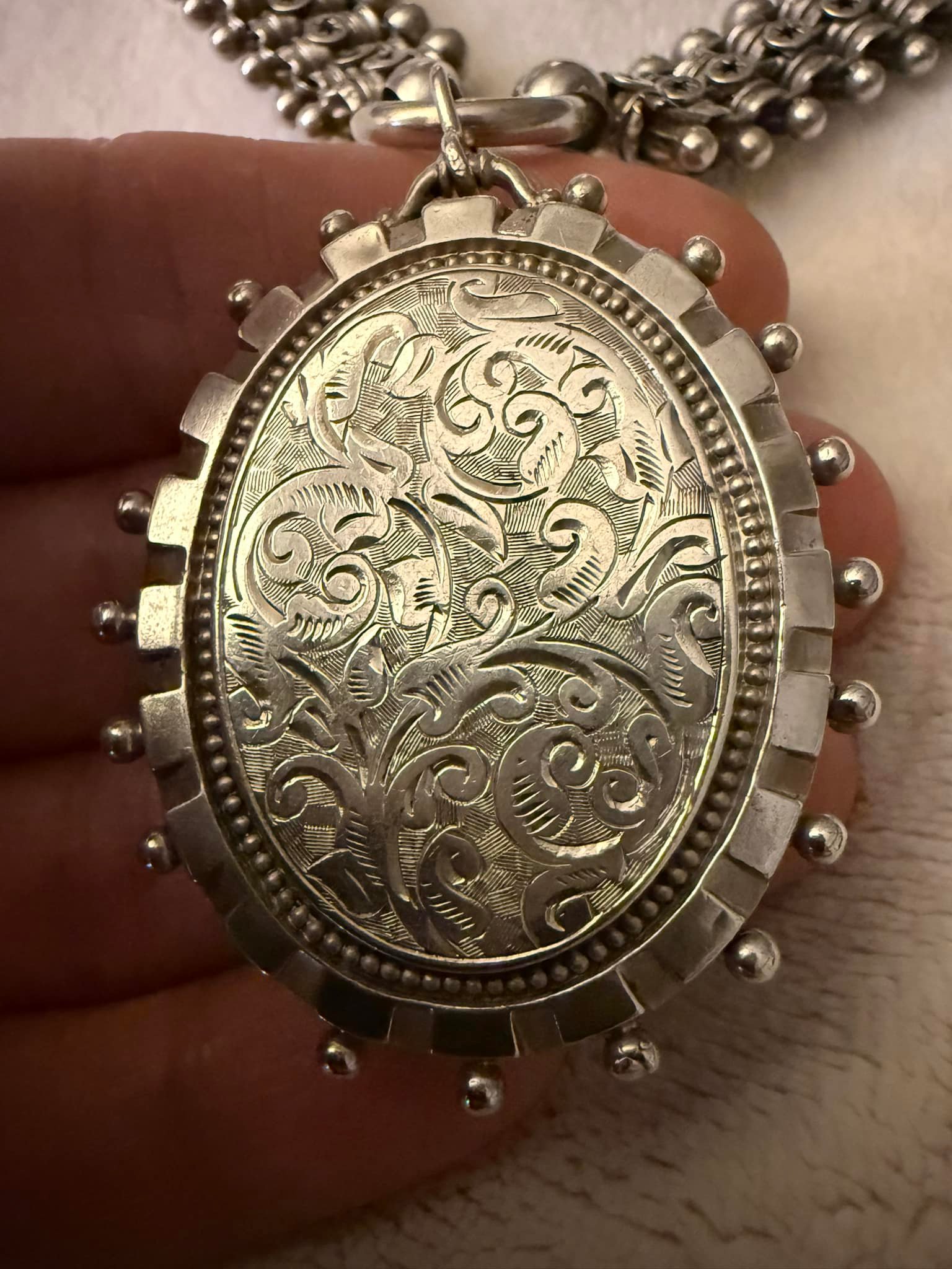 What do Victorian necklace and locket markings mean?