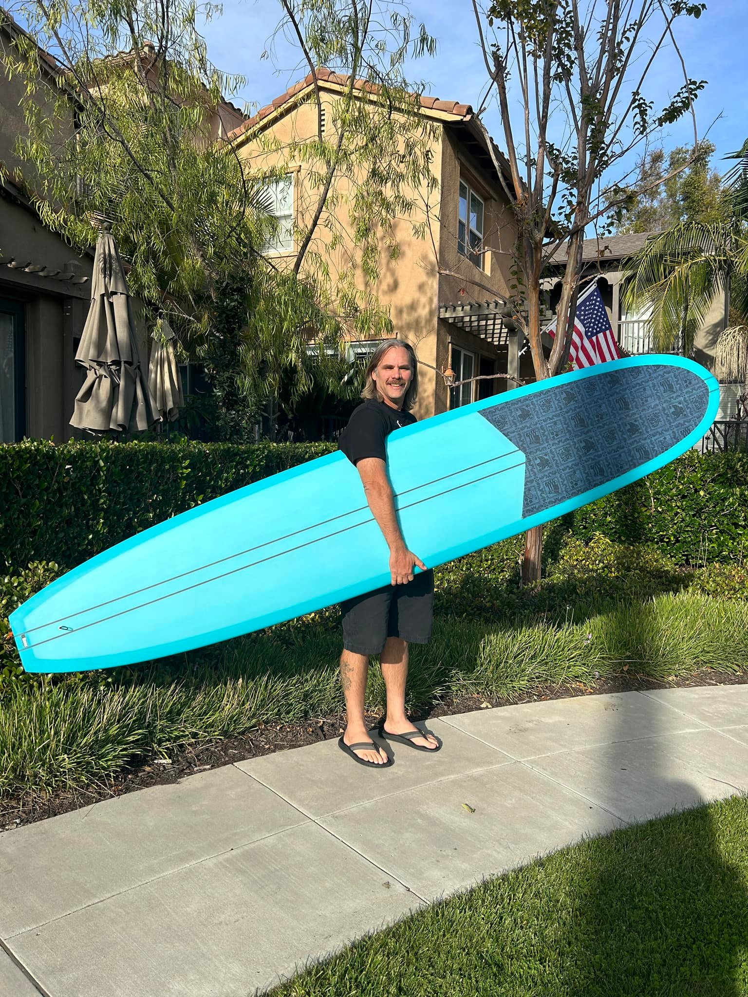Grateful for custom longboard from Ryan Engle after winning