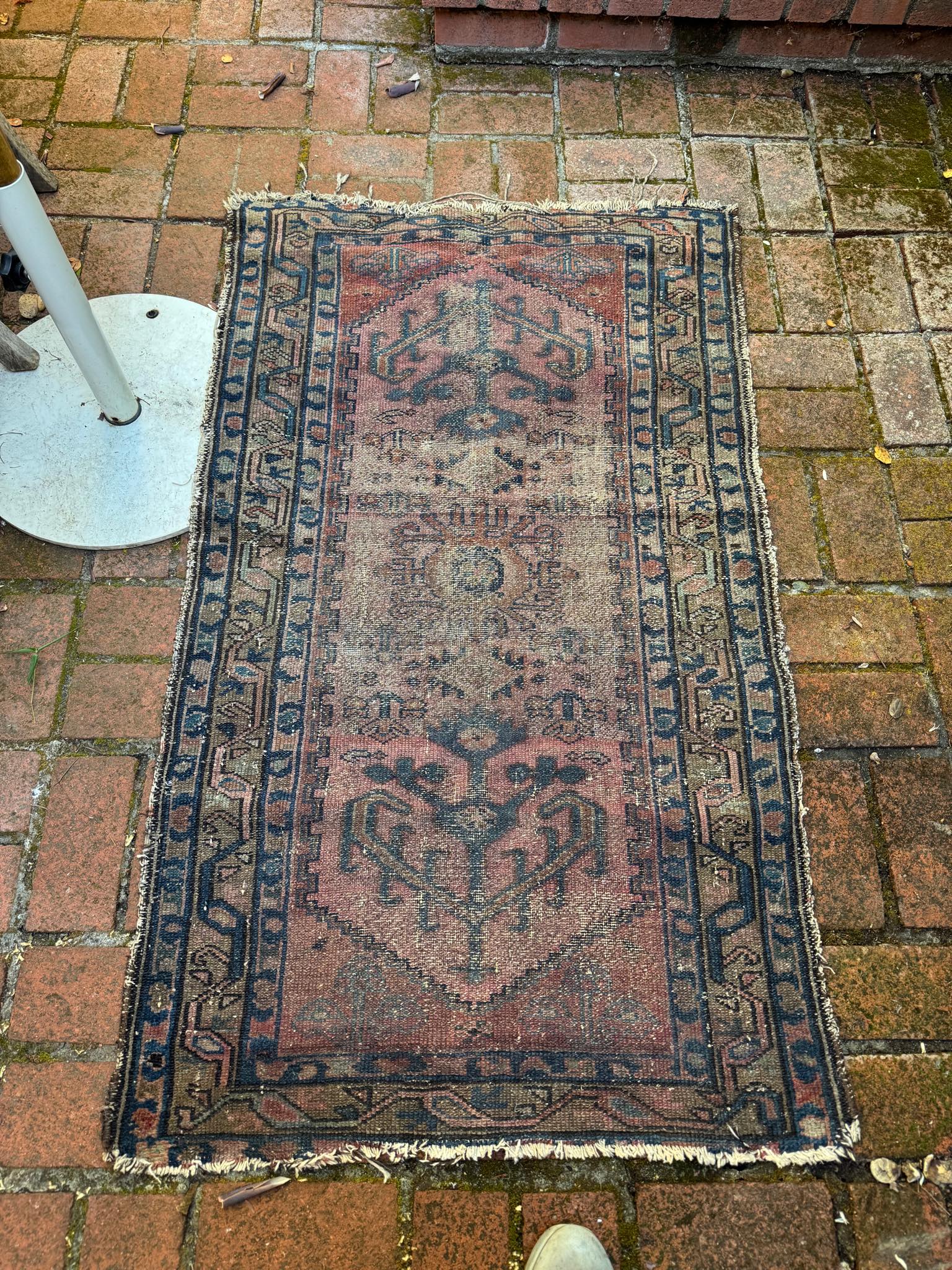Is a worn out rug still useful?