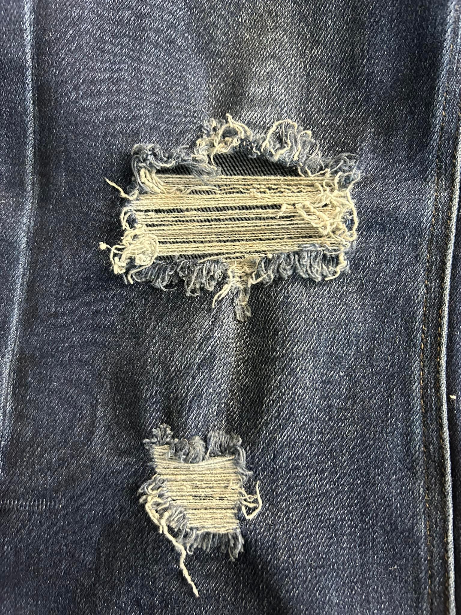 How to embellish patched thrift store jeans?