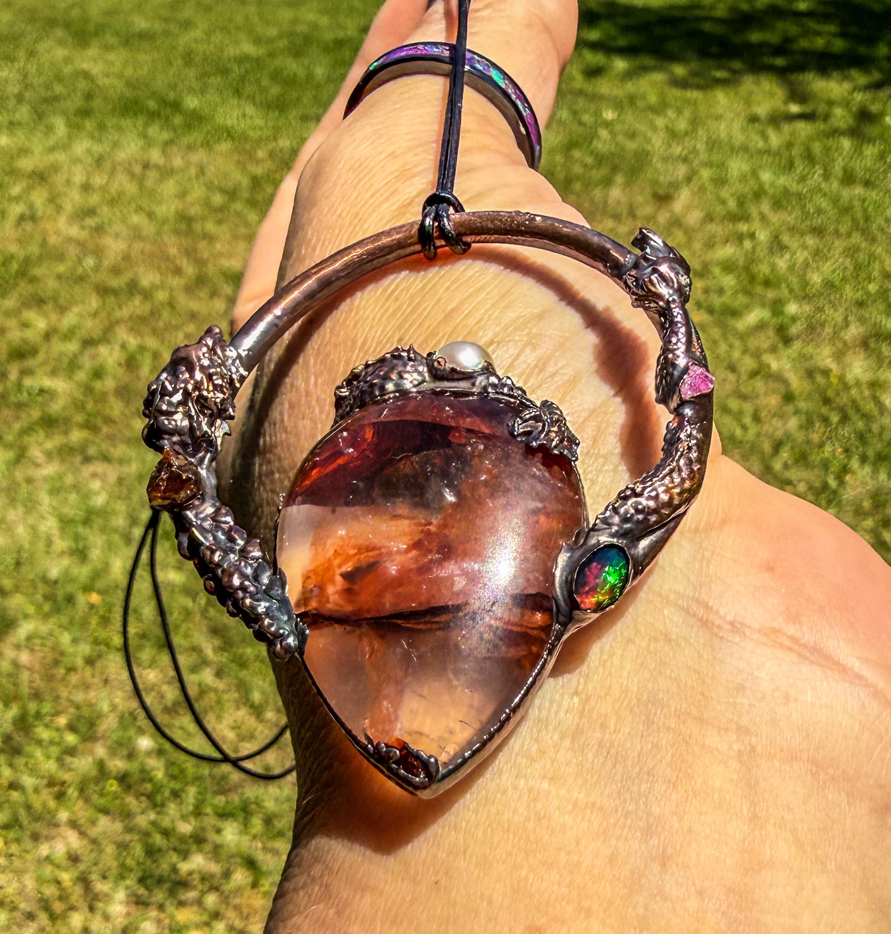 Unique dragon statement pendant with fire quartz and gemstones