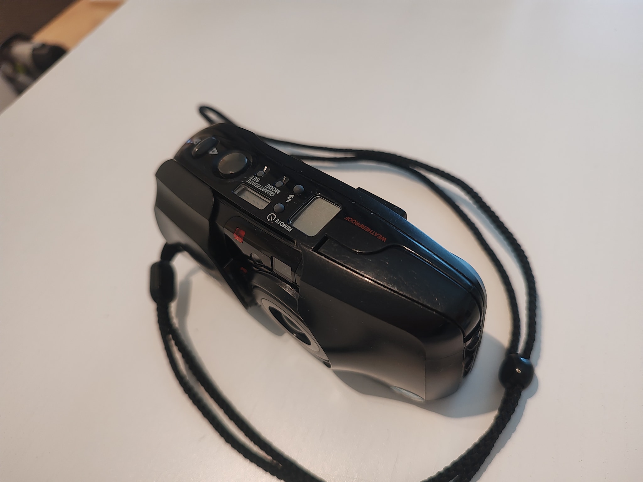 What Olympus Mju model has quartz date and zoom?
