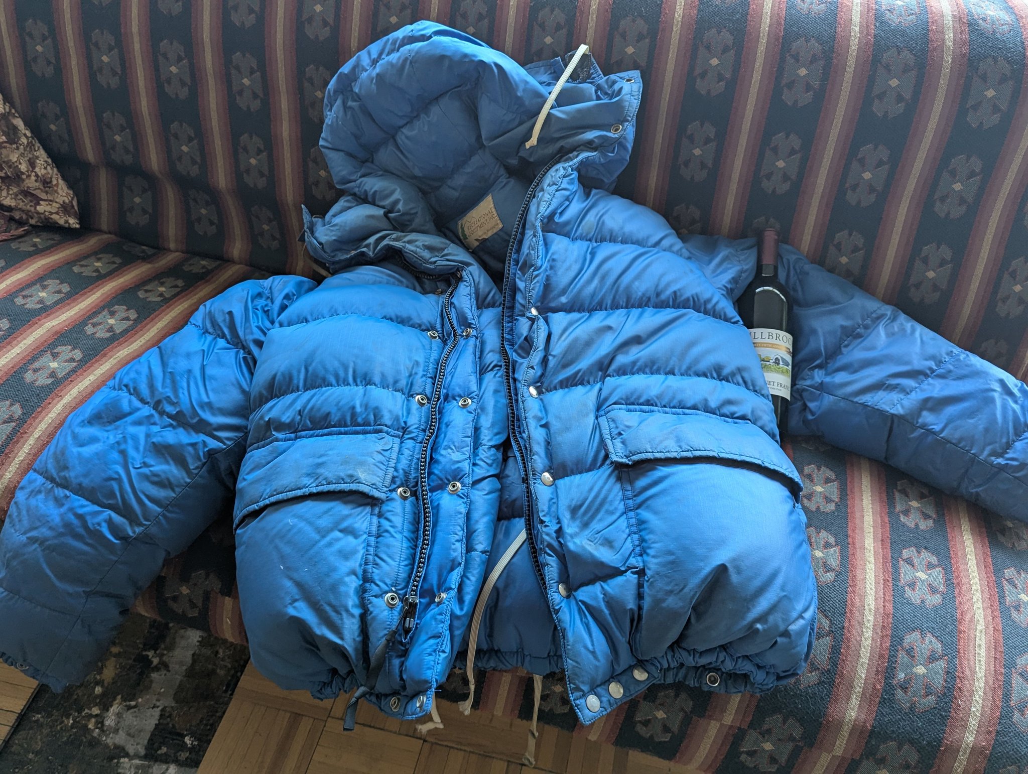 REI expedition parka down content and value