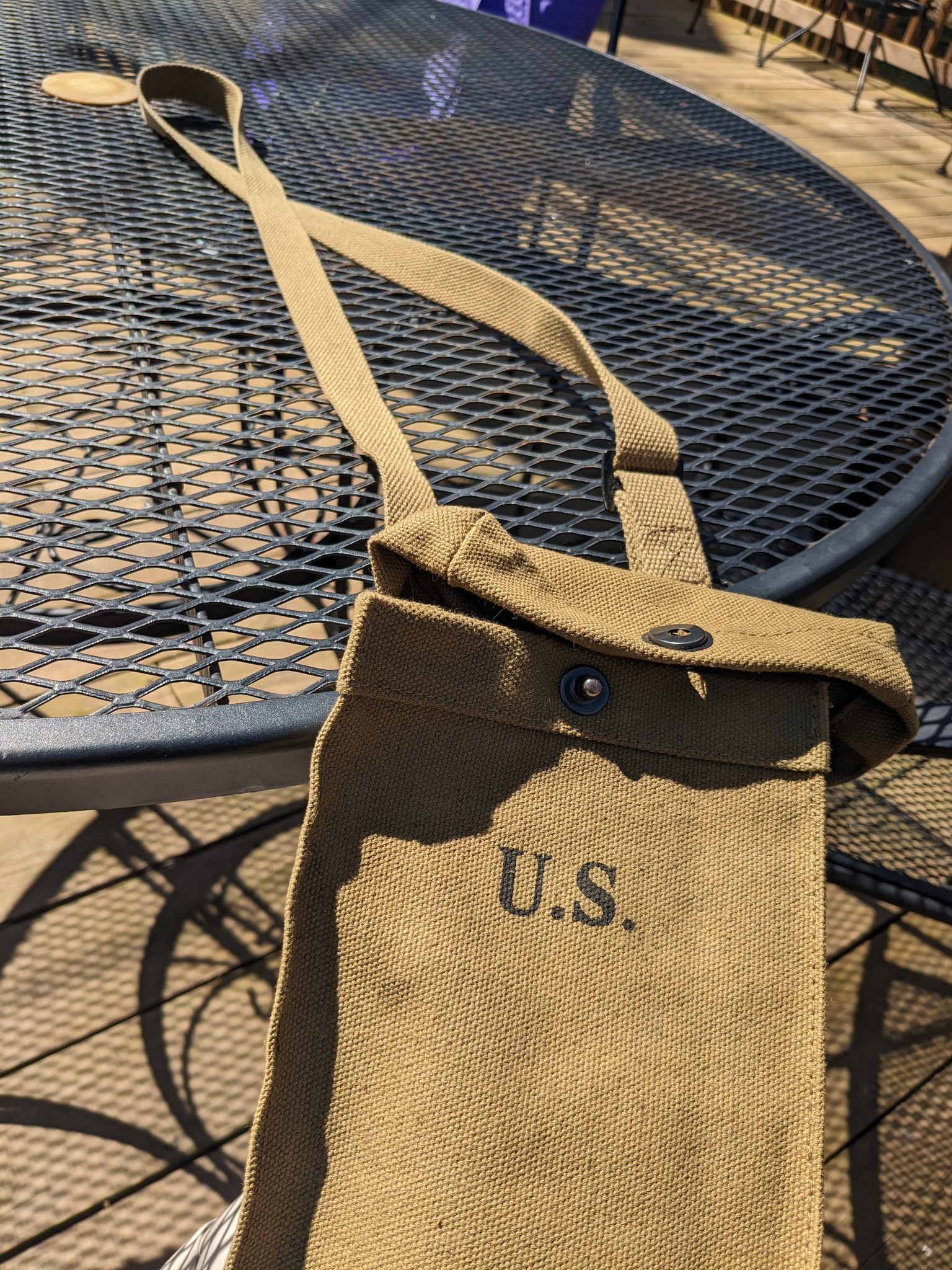 Us Army ammo bag I use to carry phone, wallet, keys. Date on back 