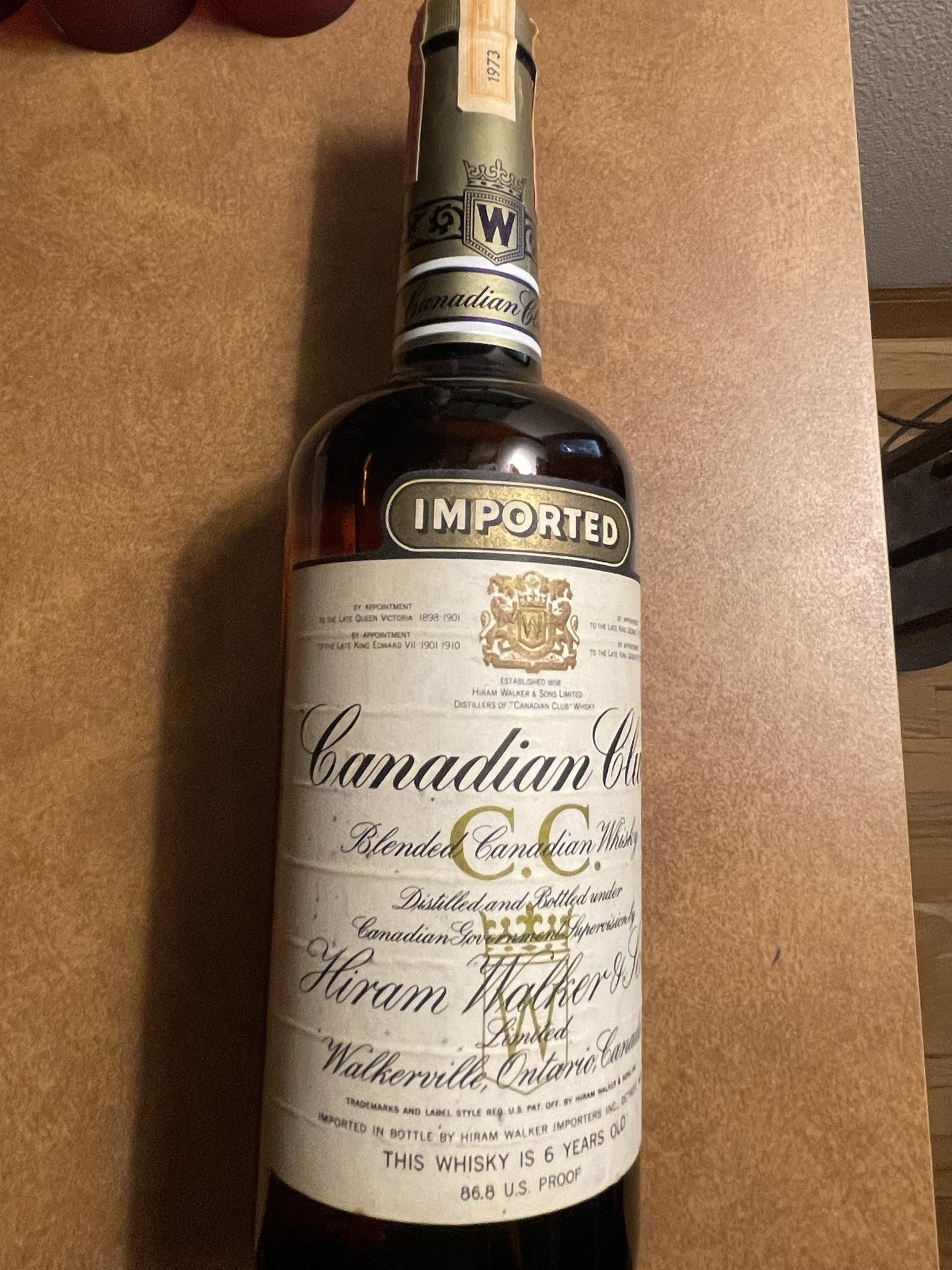 What is the value of a sealed 1971 Canadian Club whiskey bottle?