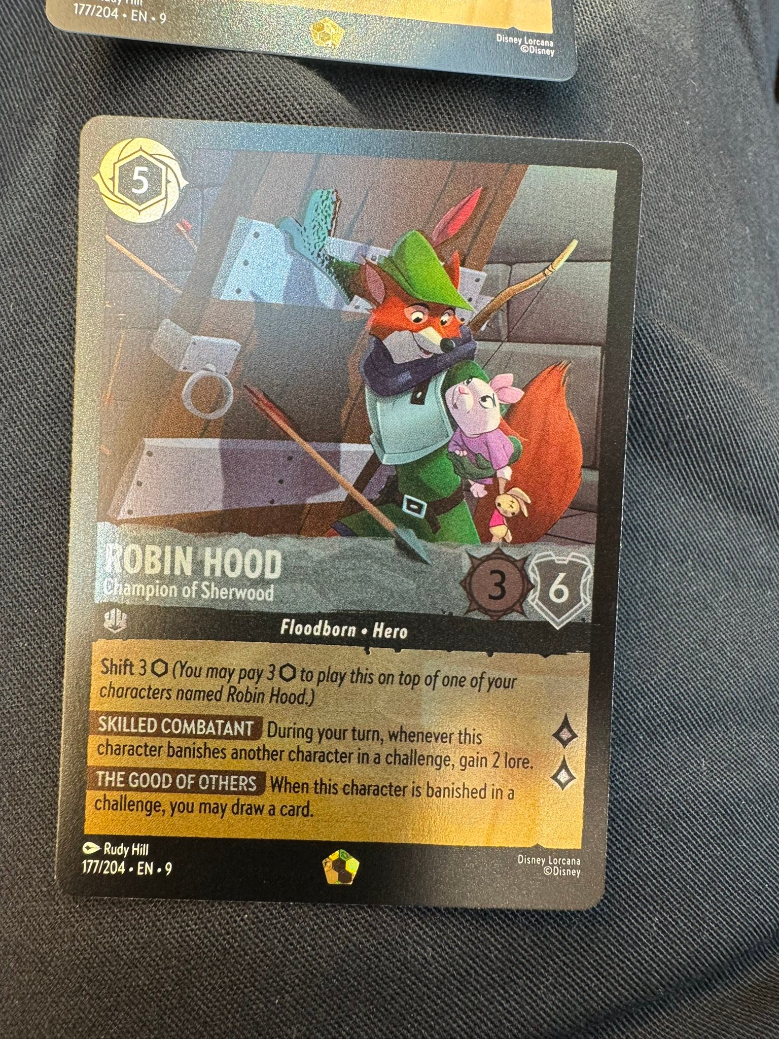 Which Disney Lorcana card is the error card, foil or non-foil?