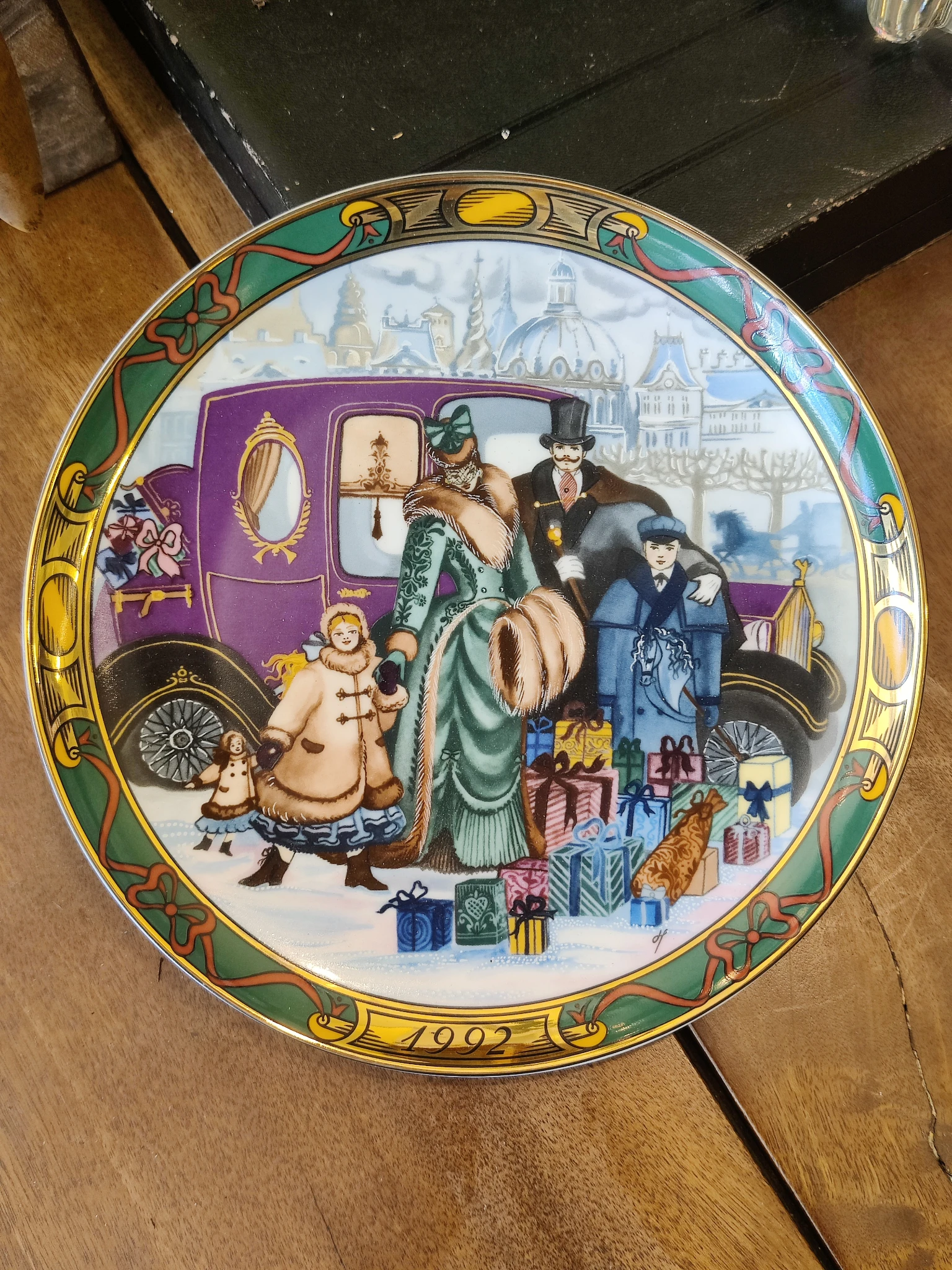 Collectible porcelain plate is blue and white. This hand-decorated 