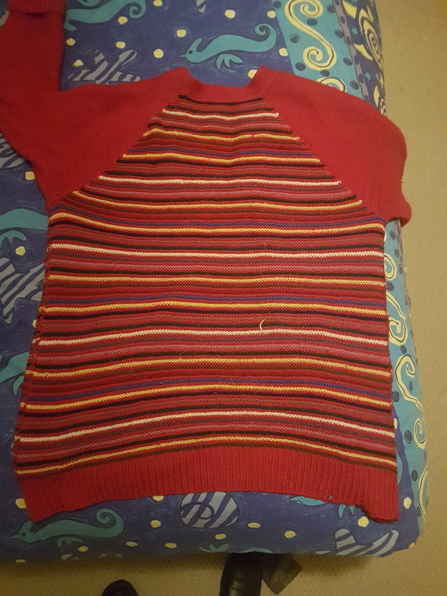 Repairing a vintage cardigan with damaged ribbing