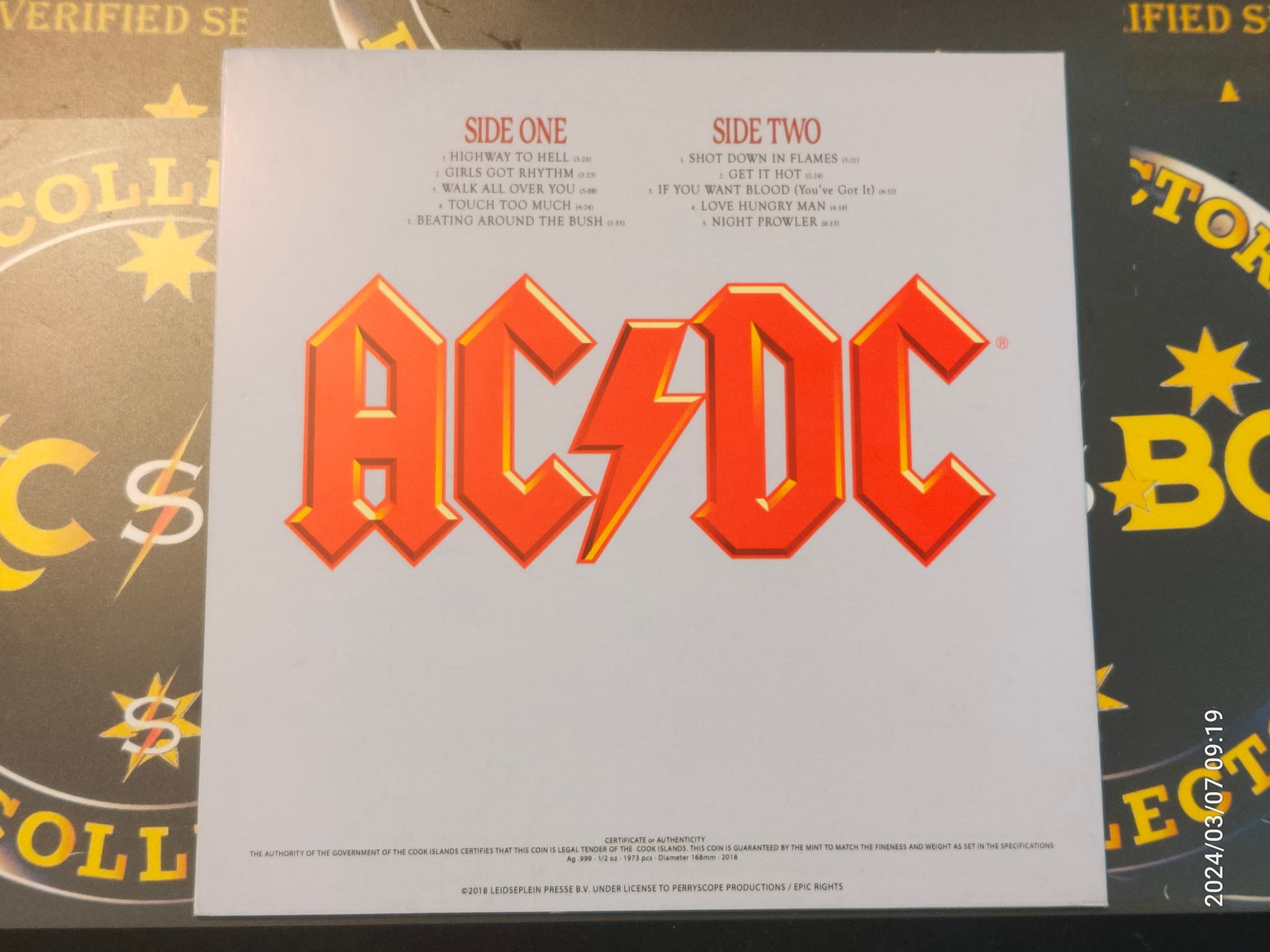 AC/DC 2 silver coin record