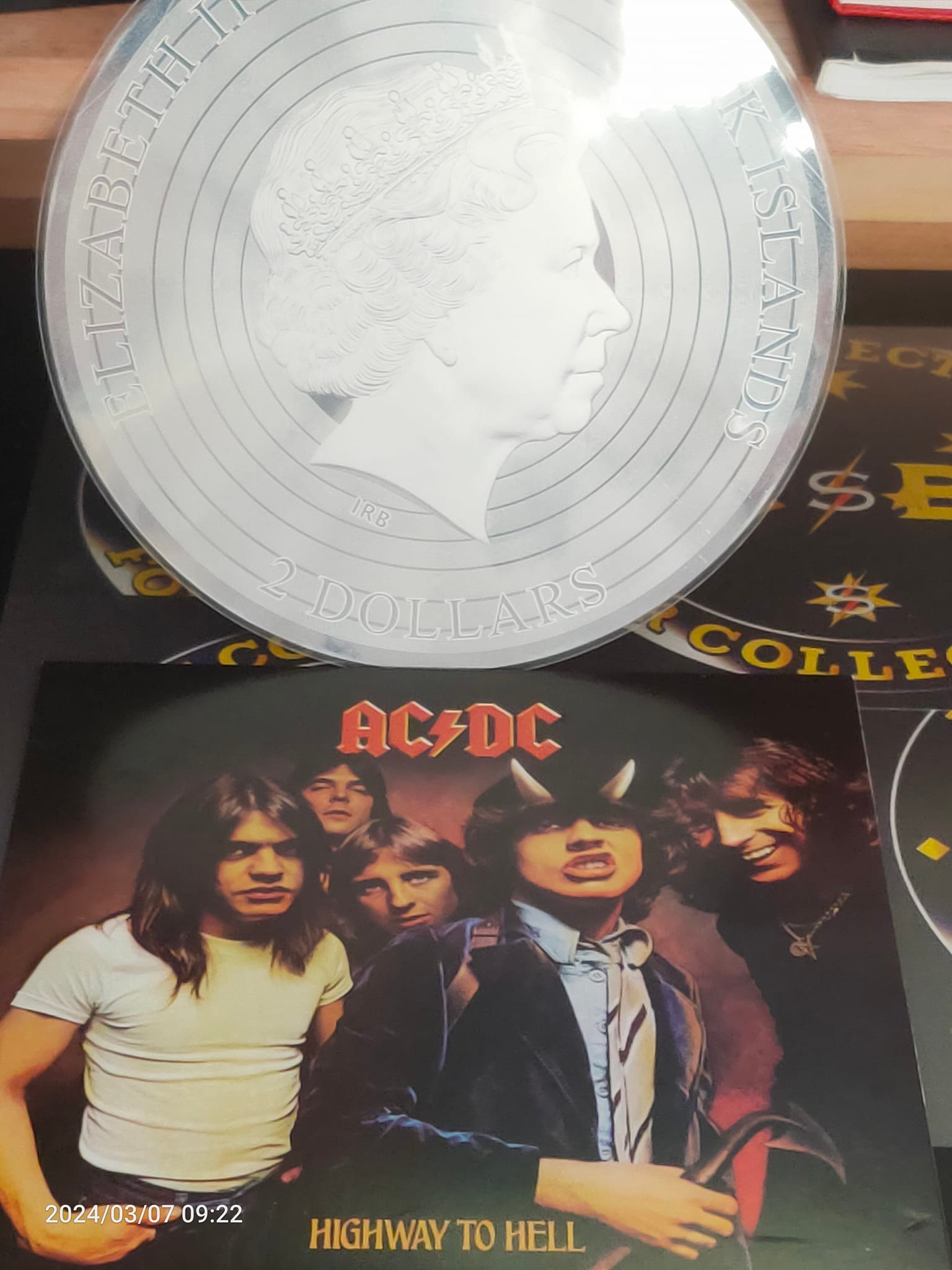 AC/DC 2 silver coin record