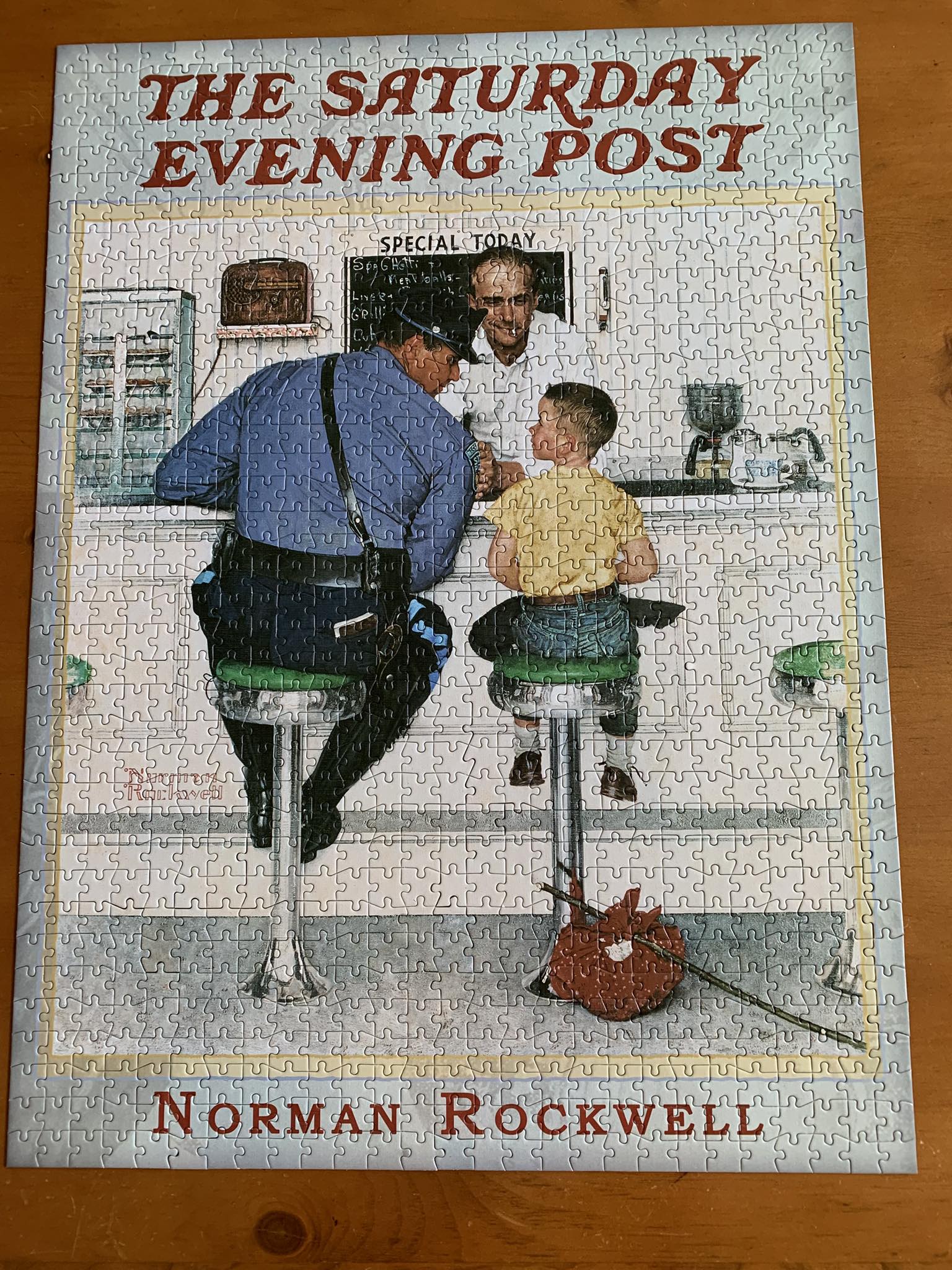 Completed Norman Rockwell Saturday Evening Post puzzle