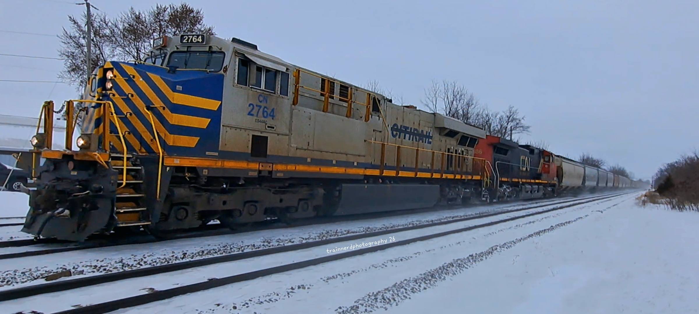 CN train 2764 and 2686 lead westbound manifest in Durand Michigan