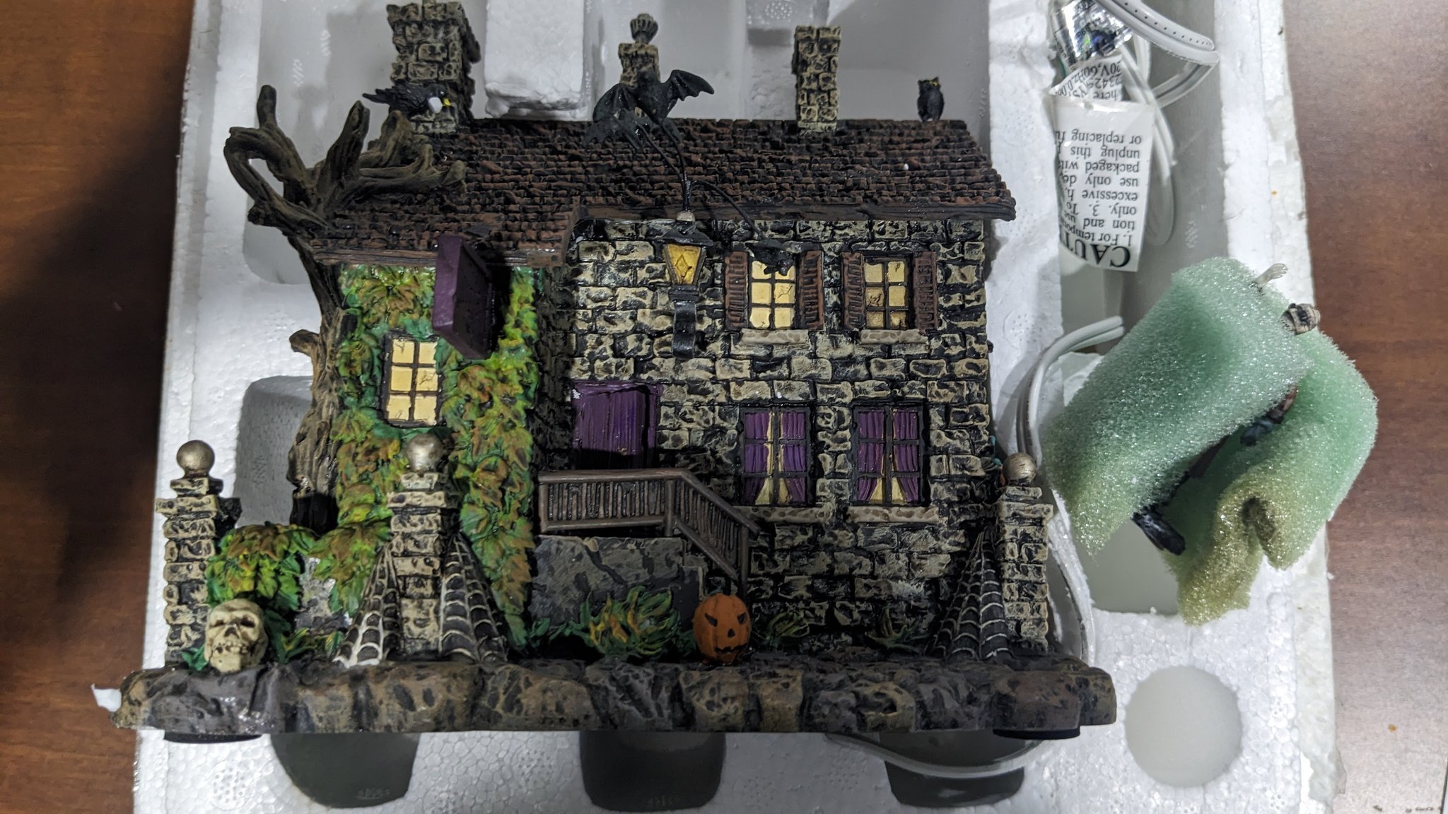 Hawthorne village houses and figurines for sale