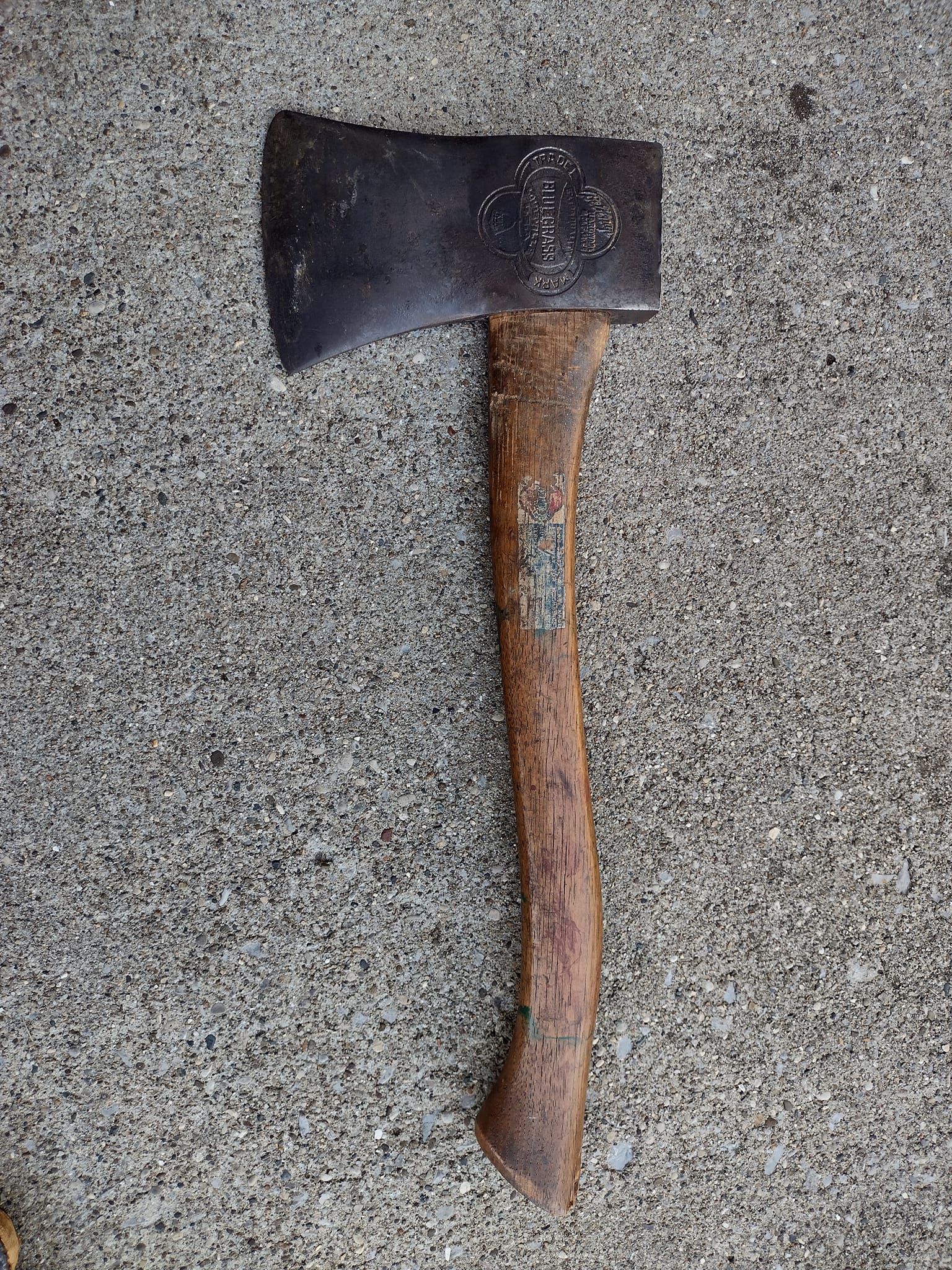 What is the age of the large Belknap Bluegrass hatchet?