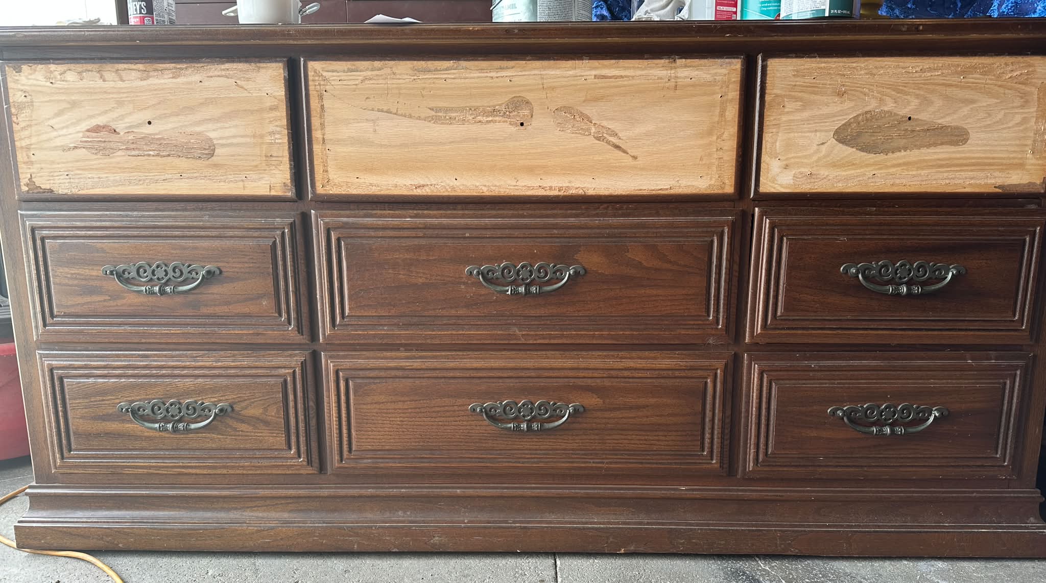 How to match top and bottom drawer styles on a wooden dresser?