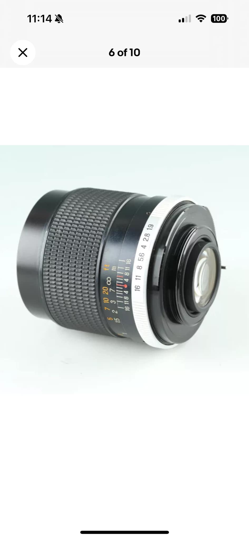 What is the information about the rare Tomioka 35mm lens?