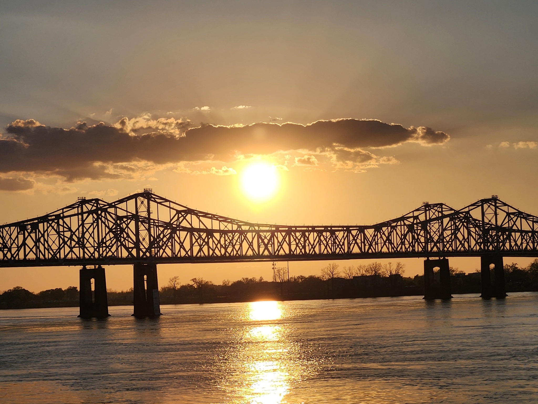 Mississippi River and bridge at Natchez sunset
