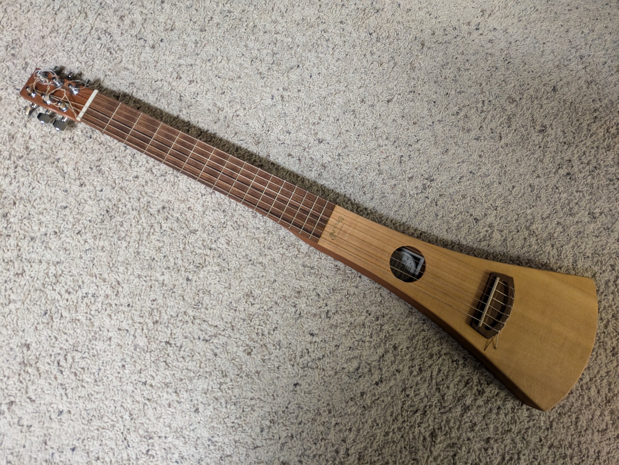 The Martin “Backpacker” travel guitar. I like the simplicity of