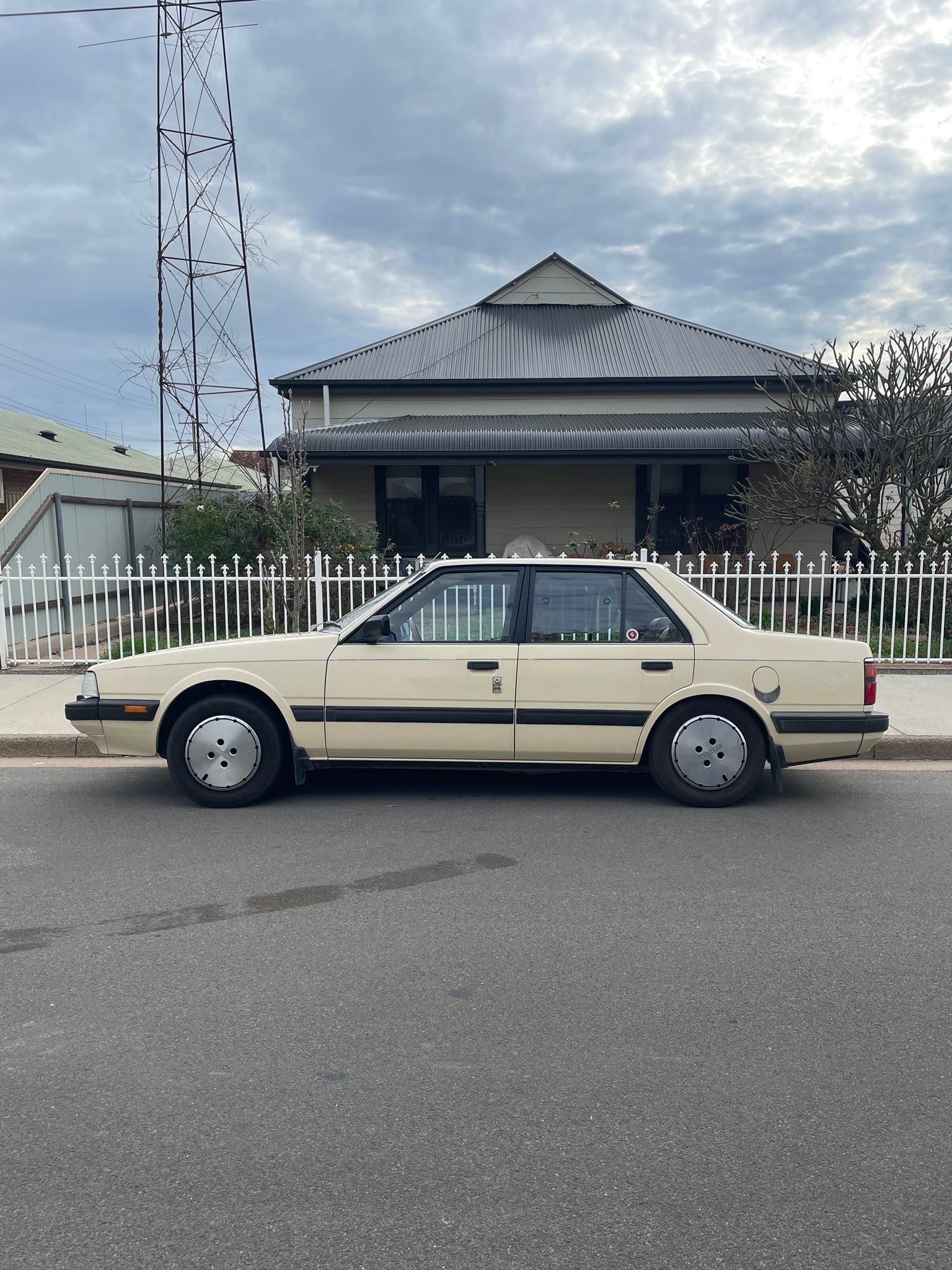 Mazda 626 hauls 150 tiles on country road trip