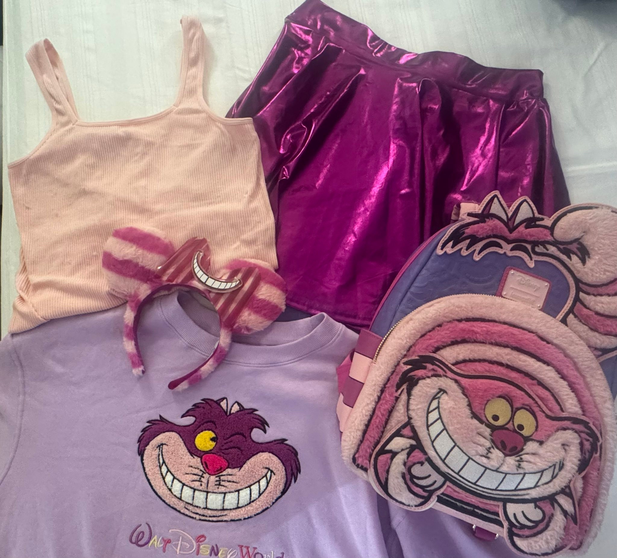 We're all mad here! Cheshire Cat bound for MK 💖💜
