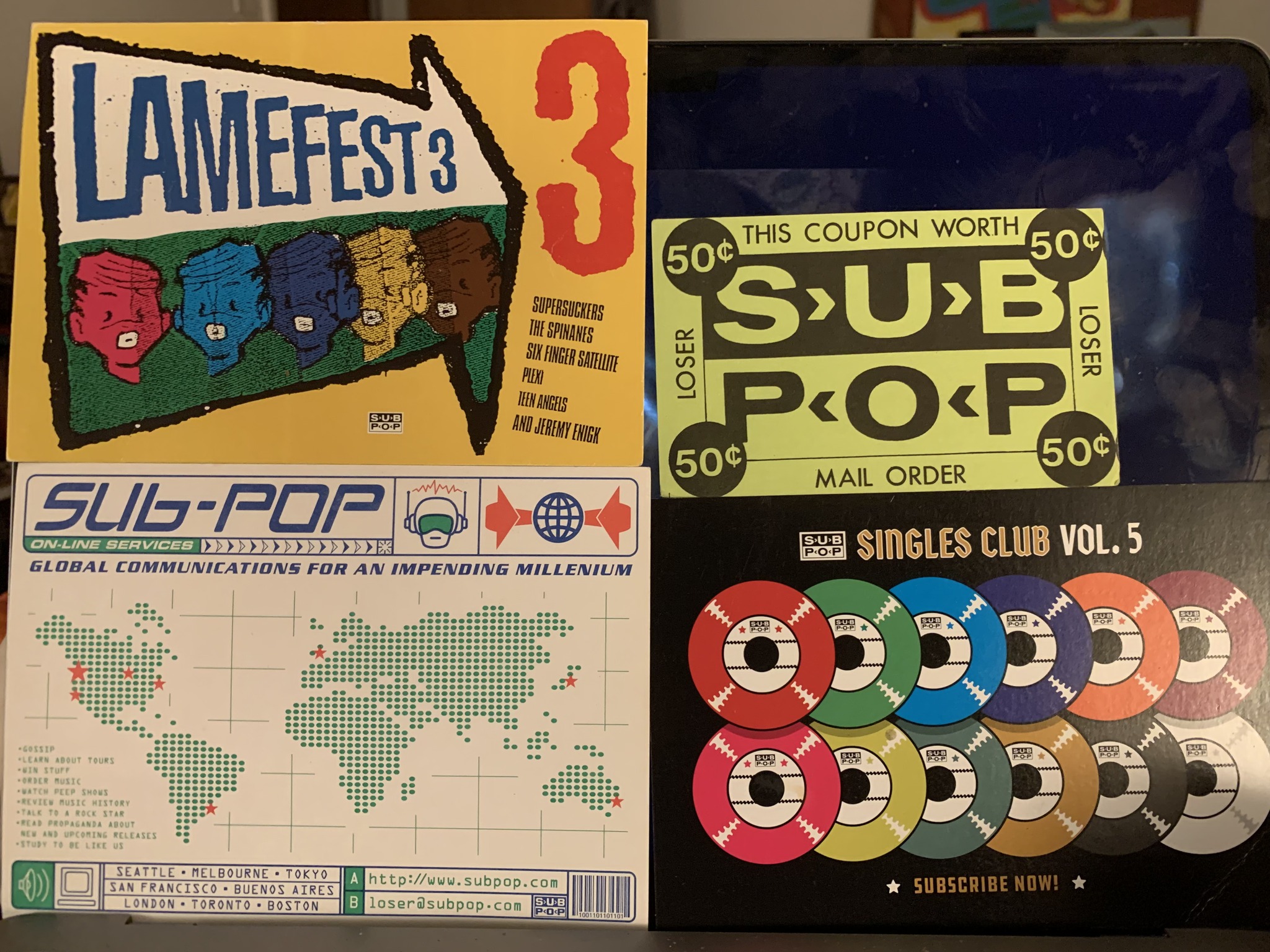 Bunch of 90s Sub Pop ephemera. Mostly Jeff Kleinsmith, I believe