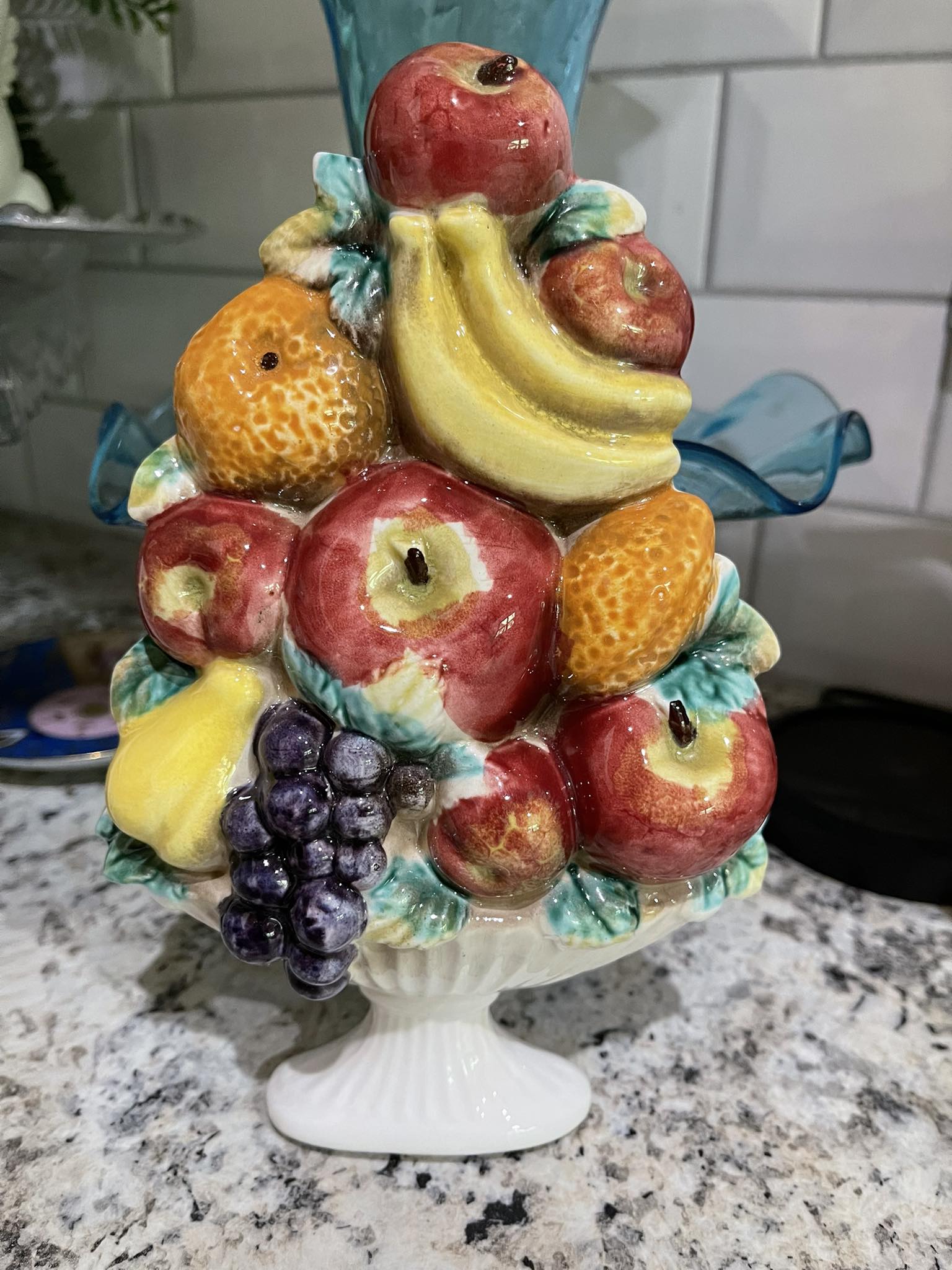 This is a vintage chalkware orange fruit wall hanging or plaque
