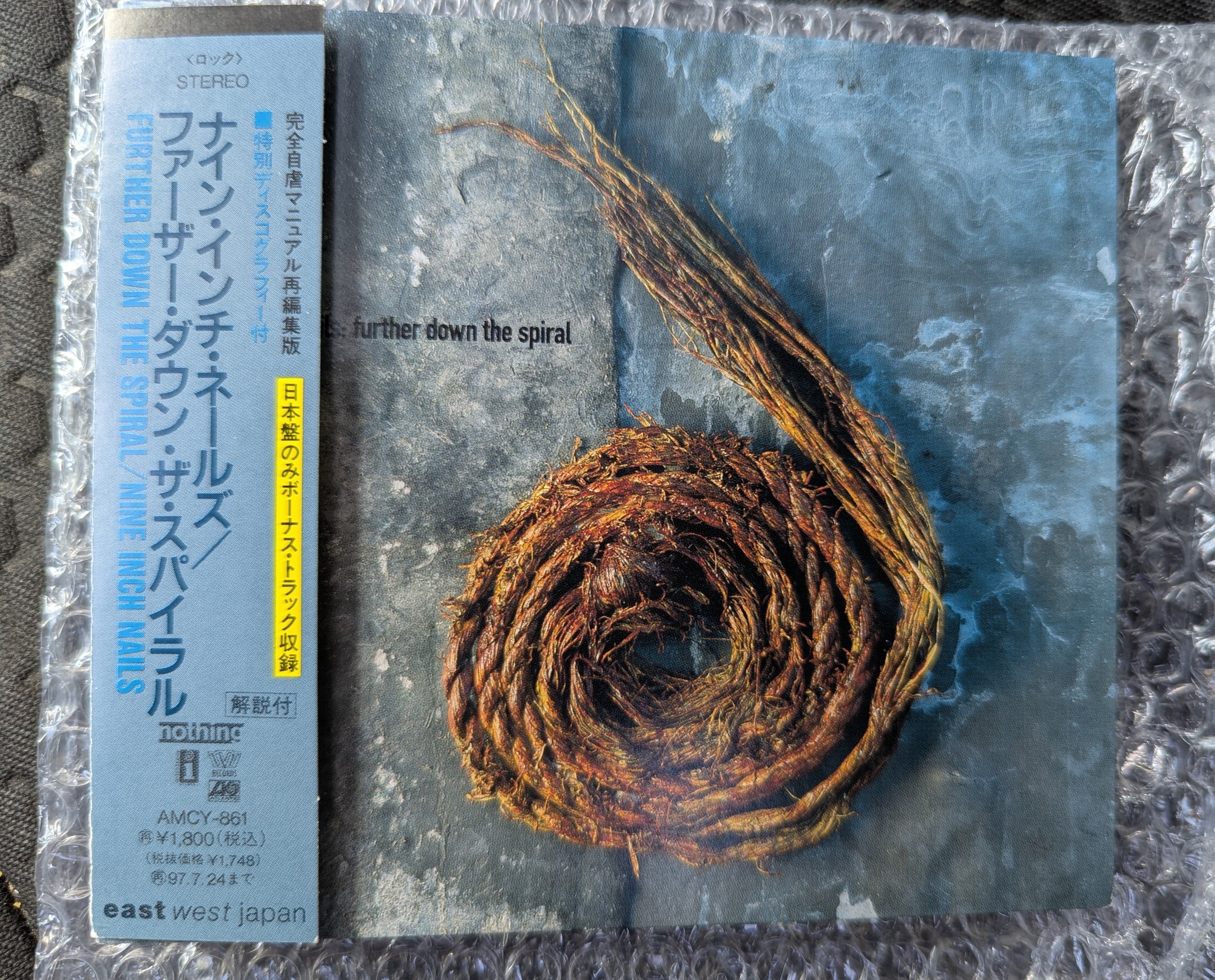 Japanese edition of Down the Spiral with Reptilian bonus track