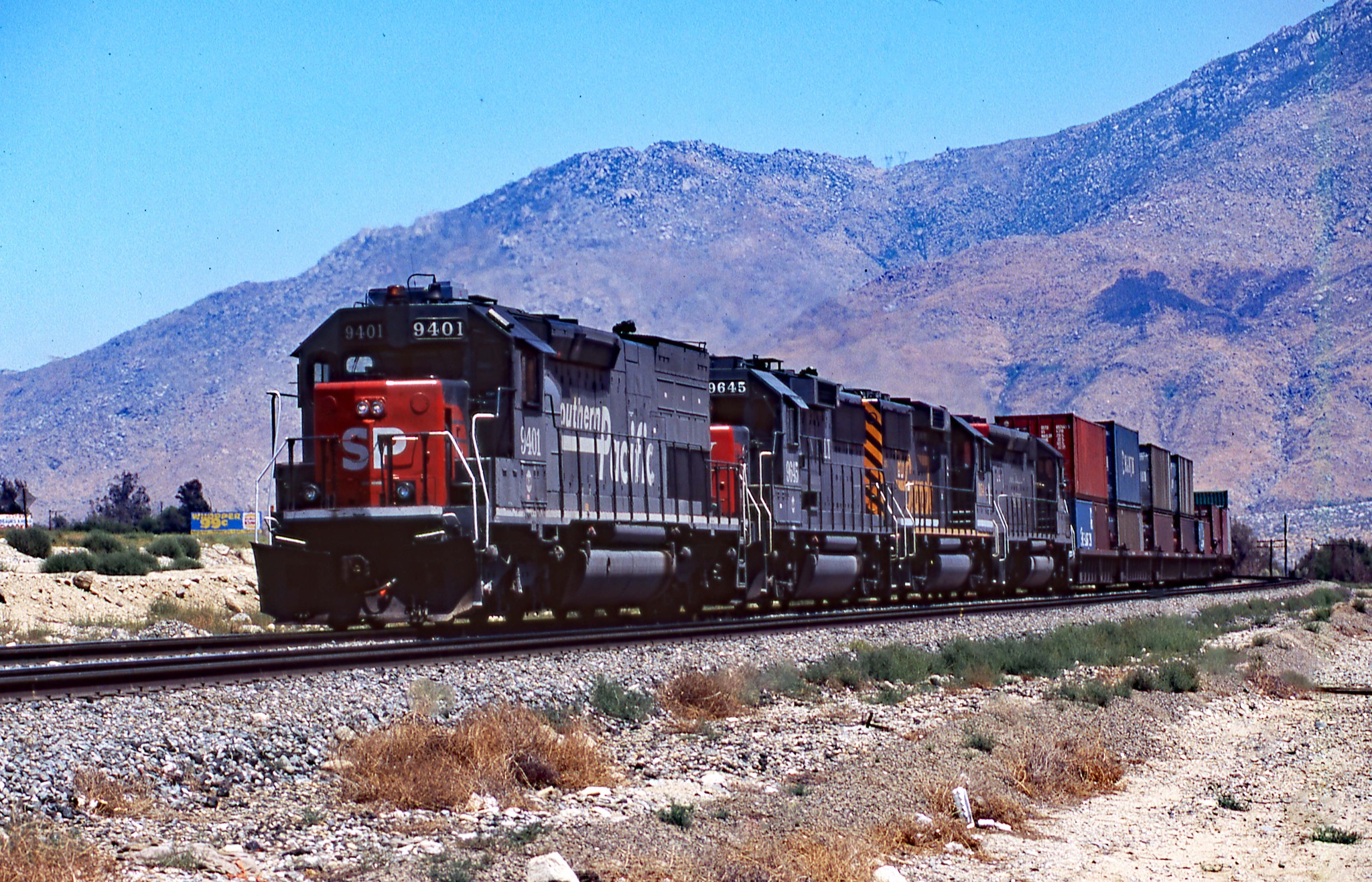 SP SD45R 7459 west at Stanford Curve in July 1994