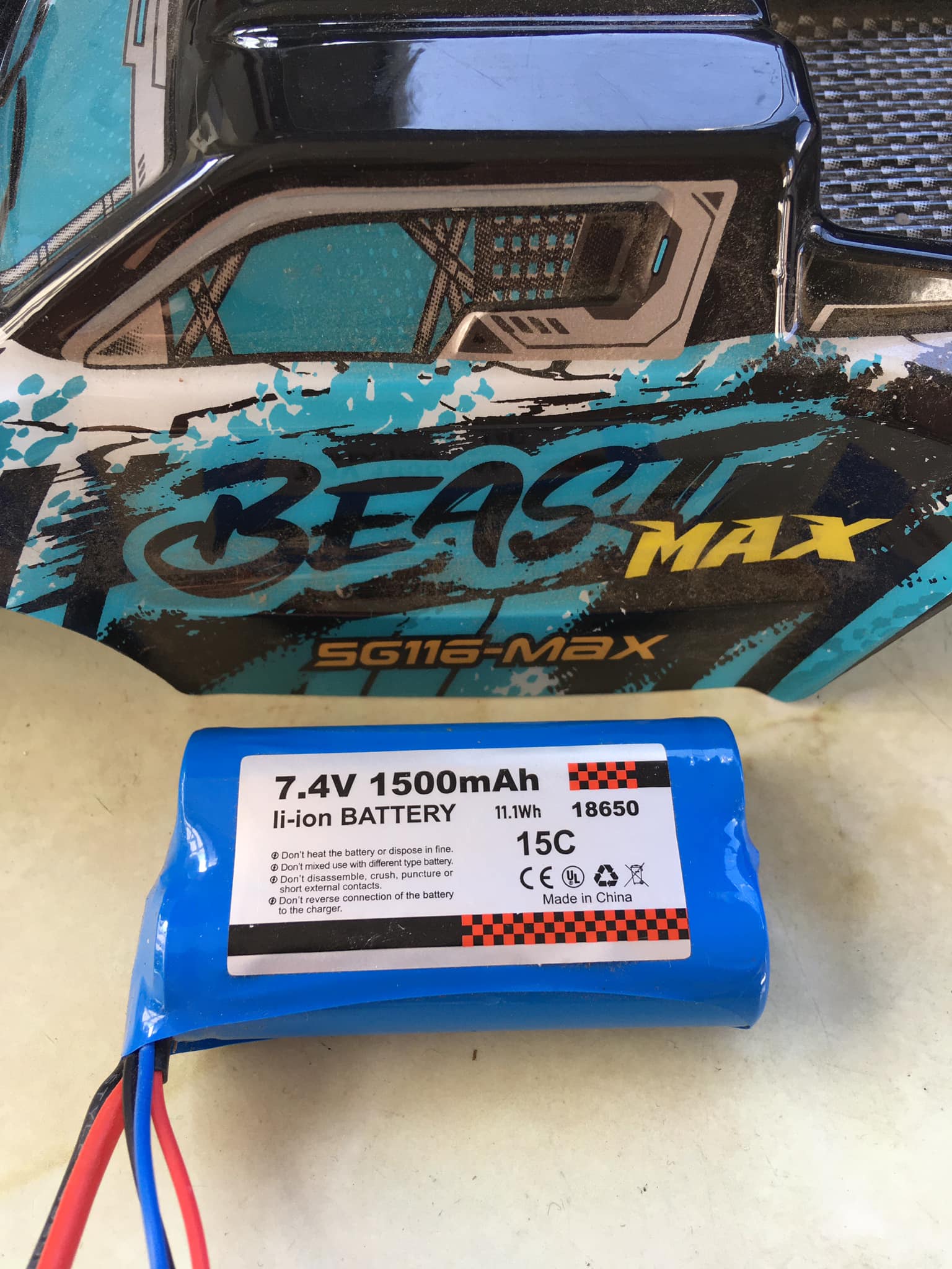 What battery is recommended for a 1/10 scale spawn?