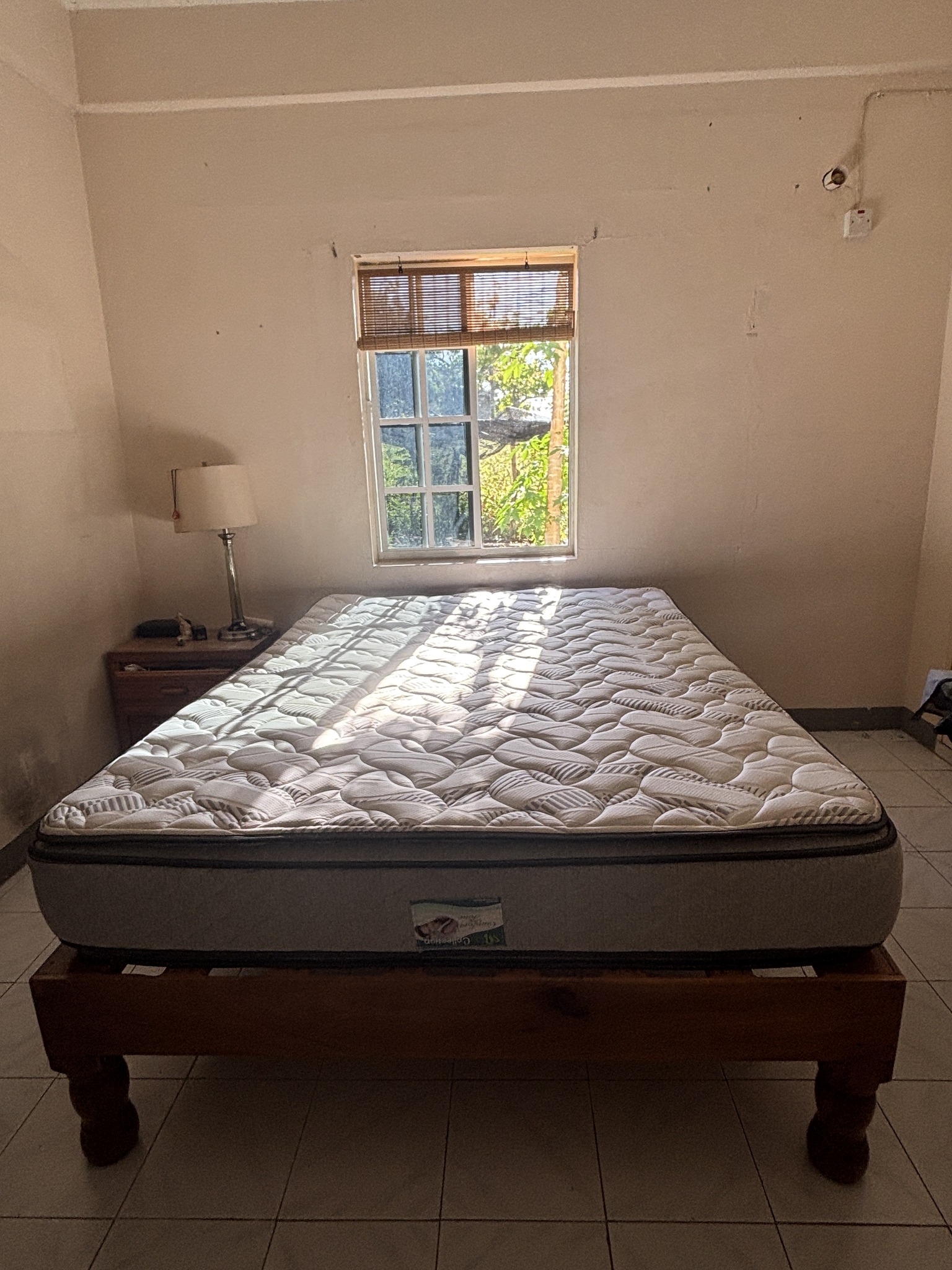 Double bed wooden base and mattress for sale in Treasure Beach