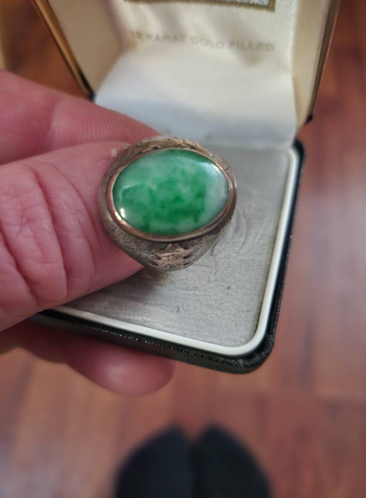 What is the origin and value of this ring with a pagoda, monkeys