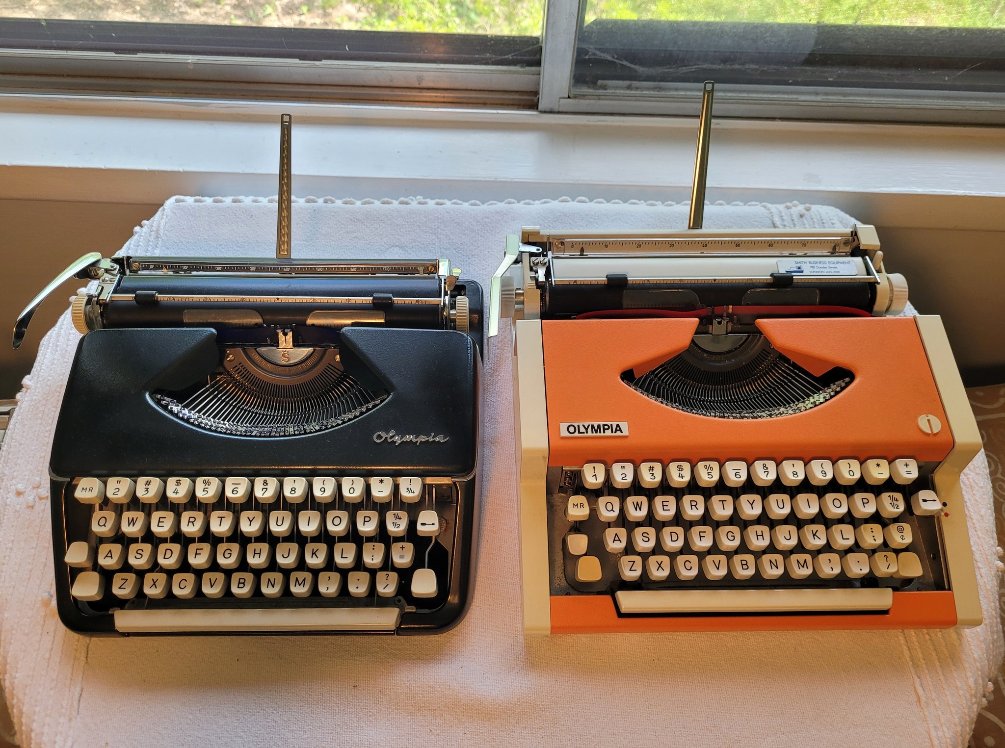 Vintage Olympia typewriters from 1960 and 1975 in family reunion