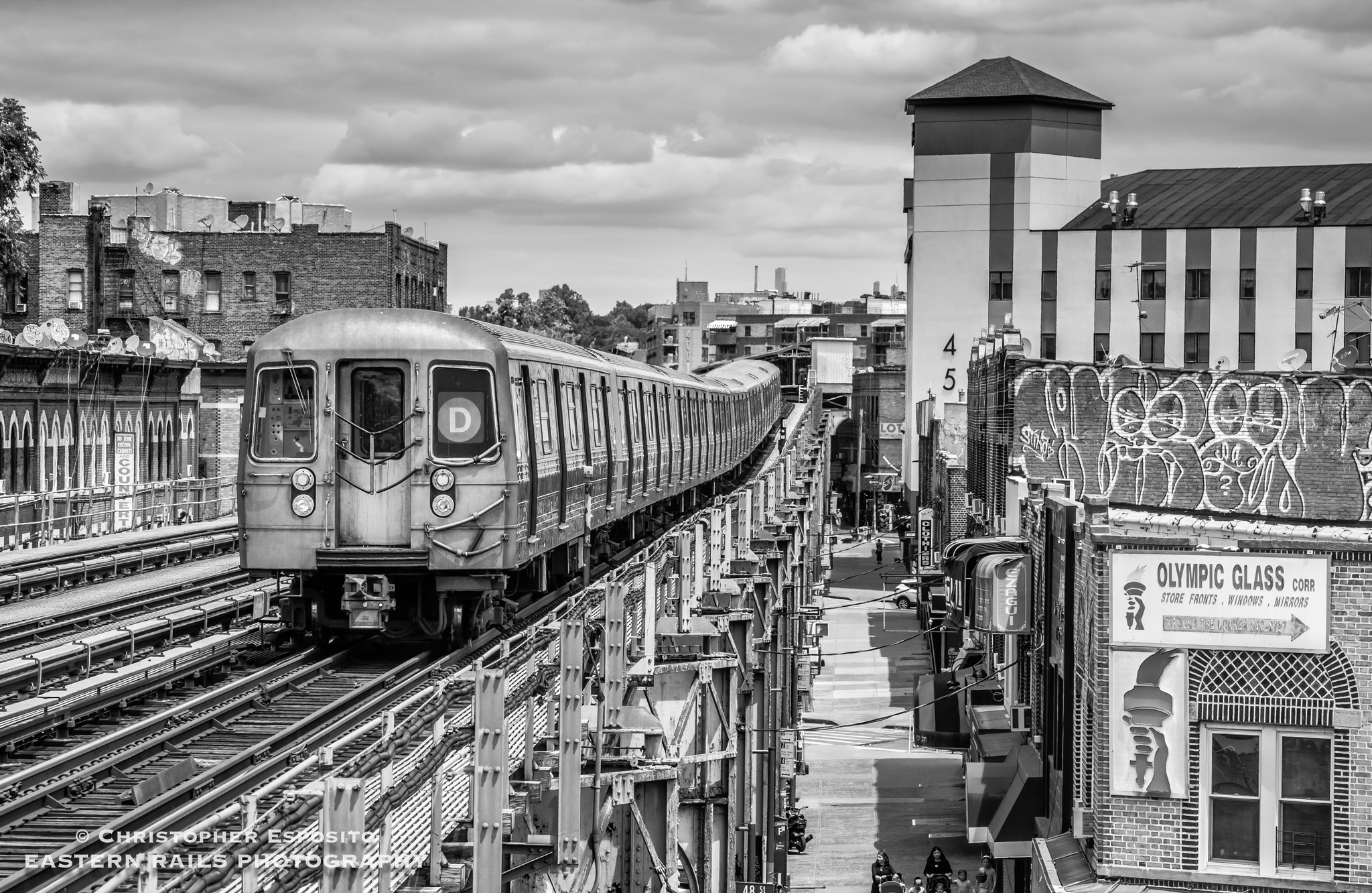 R-68 train approaching 25th Ave Station in 1988