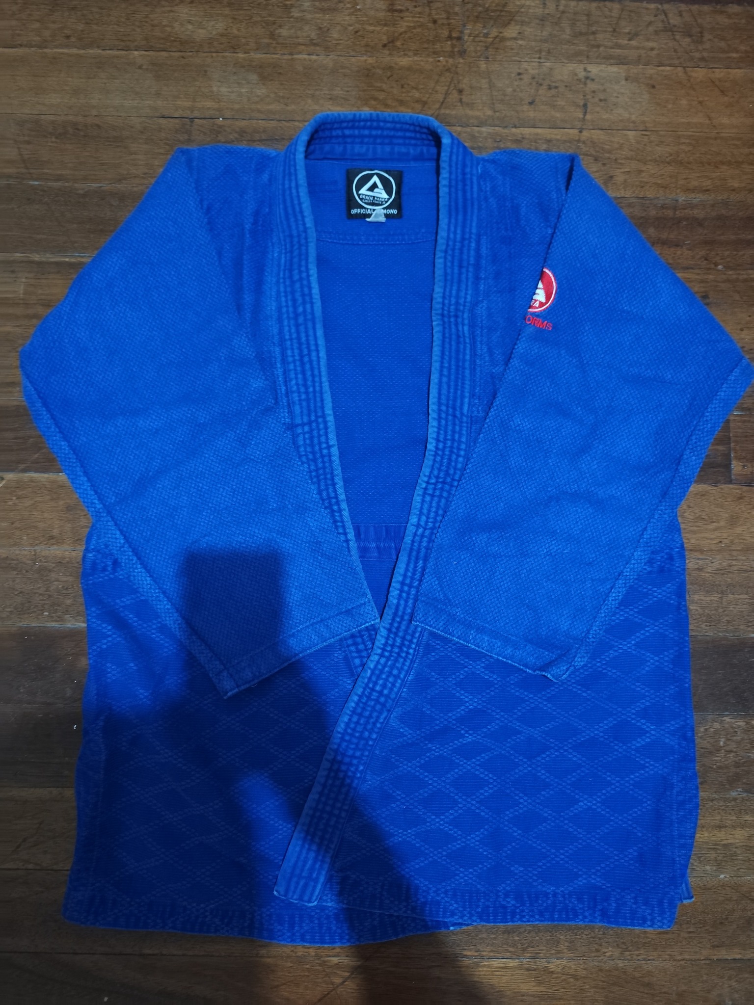 Awesome black BJJ gi has Shoyoroll and Ataque branding. Gi top has 