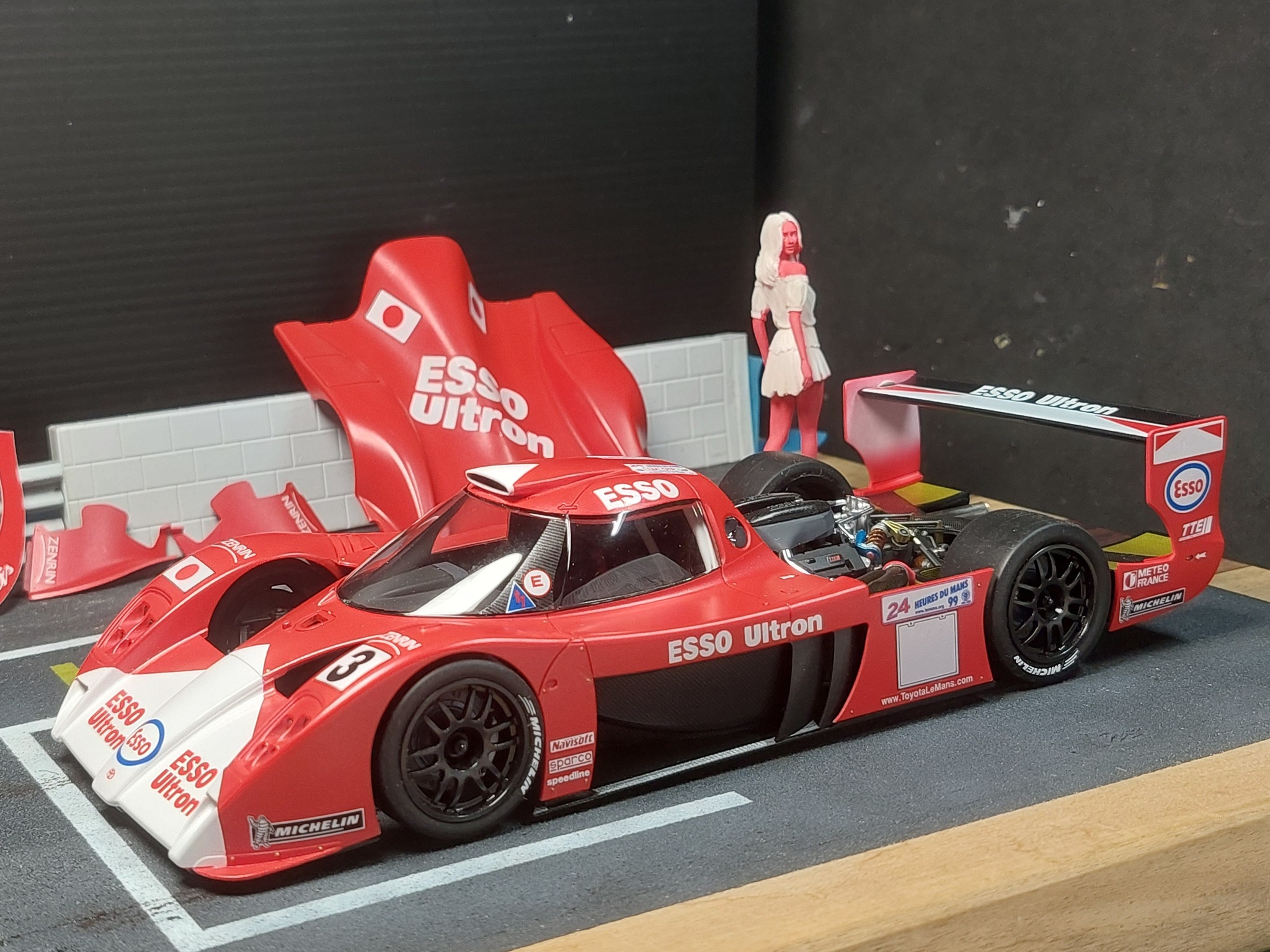 Tamiya Toyota GT-ONE model car in matt bright red