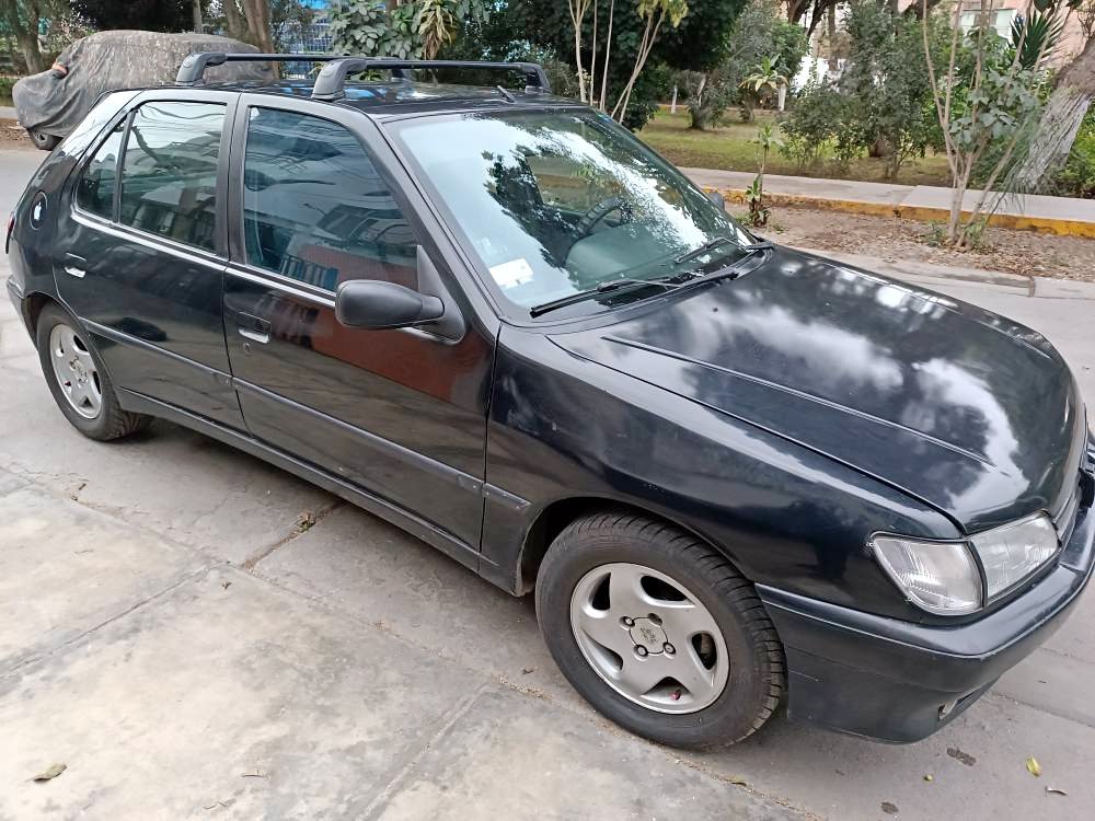 1994: Ray Charles guida Peugeot 306 Cabriolet in uno spot memorabile
