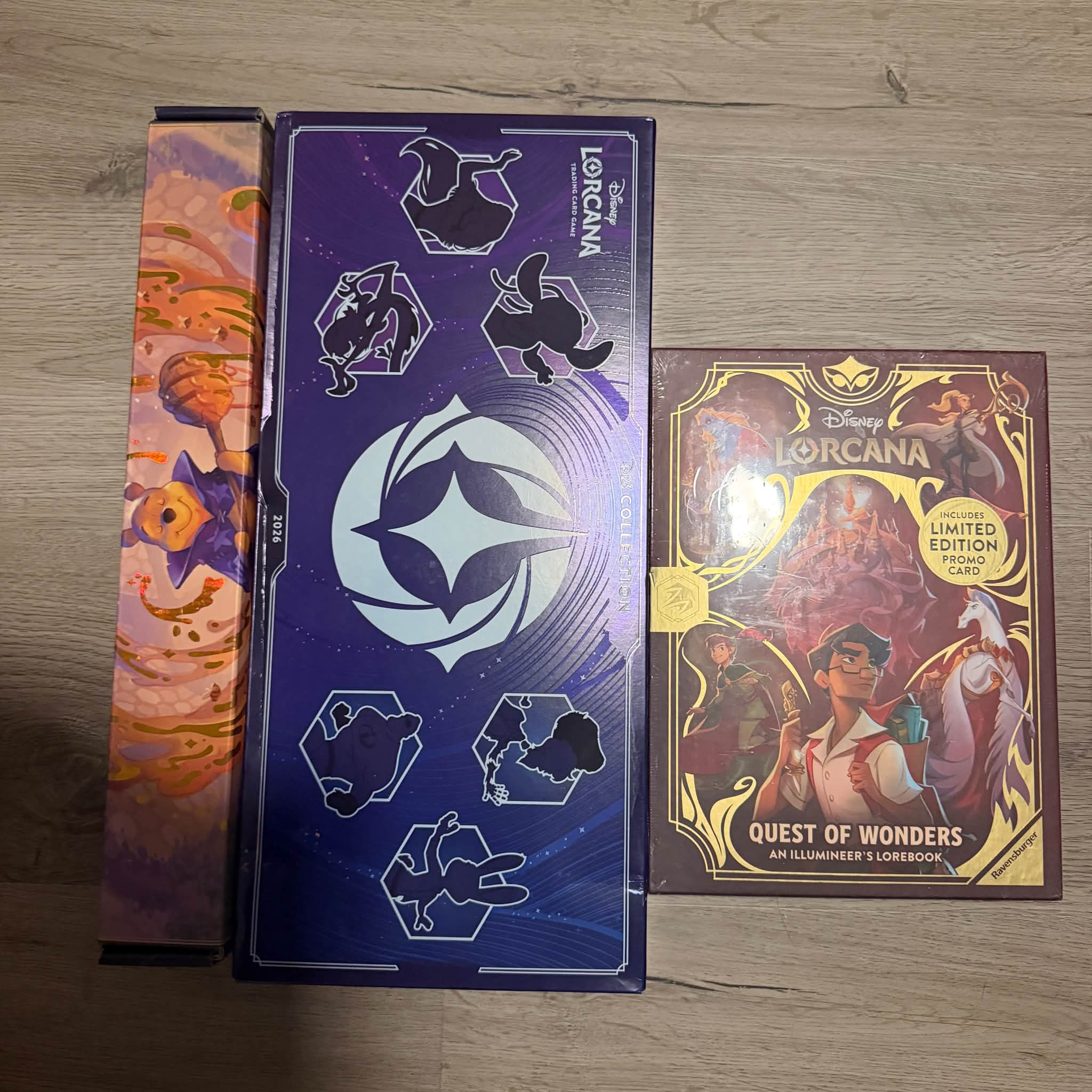 D23 Lorcana bundle with foil play mat, Quest of Wonders, and